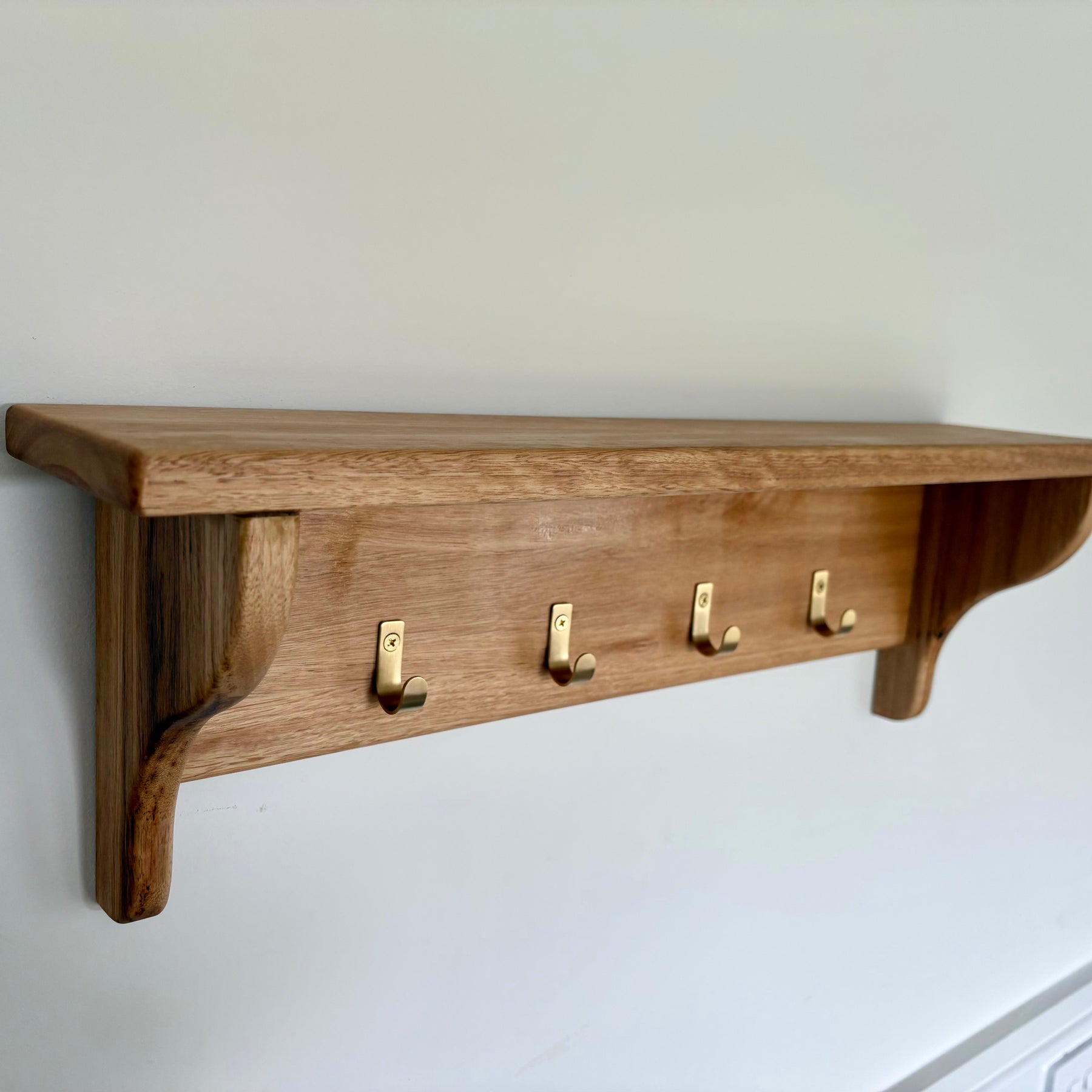 Blackbutt wall shelf with gold hooks