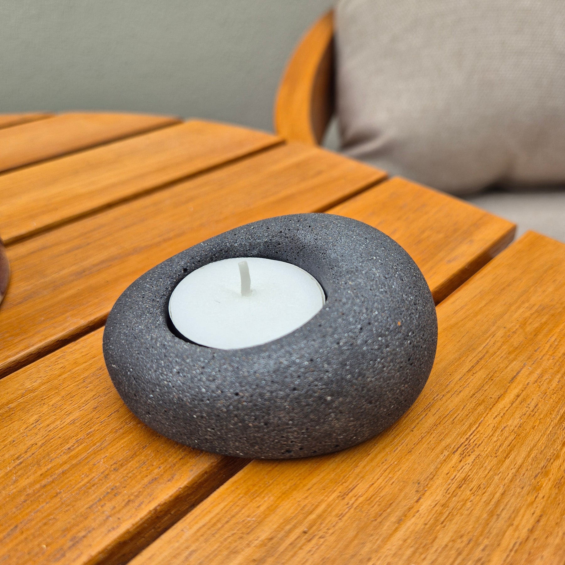 Black eco-stone pebble shaped tealight candle holder