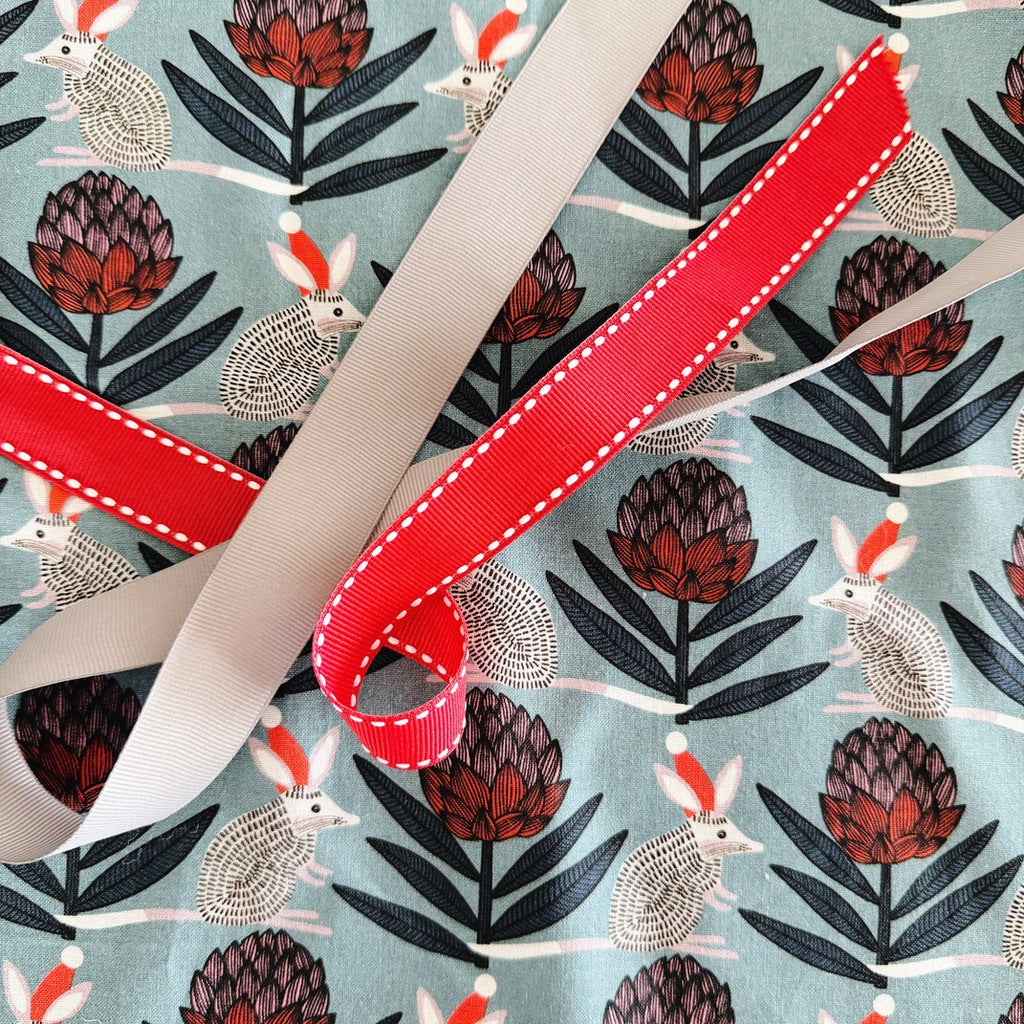 Bilby and waratahs Christmas ladies' tie back apron.