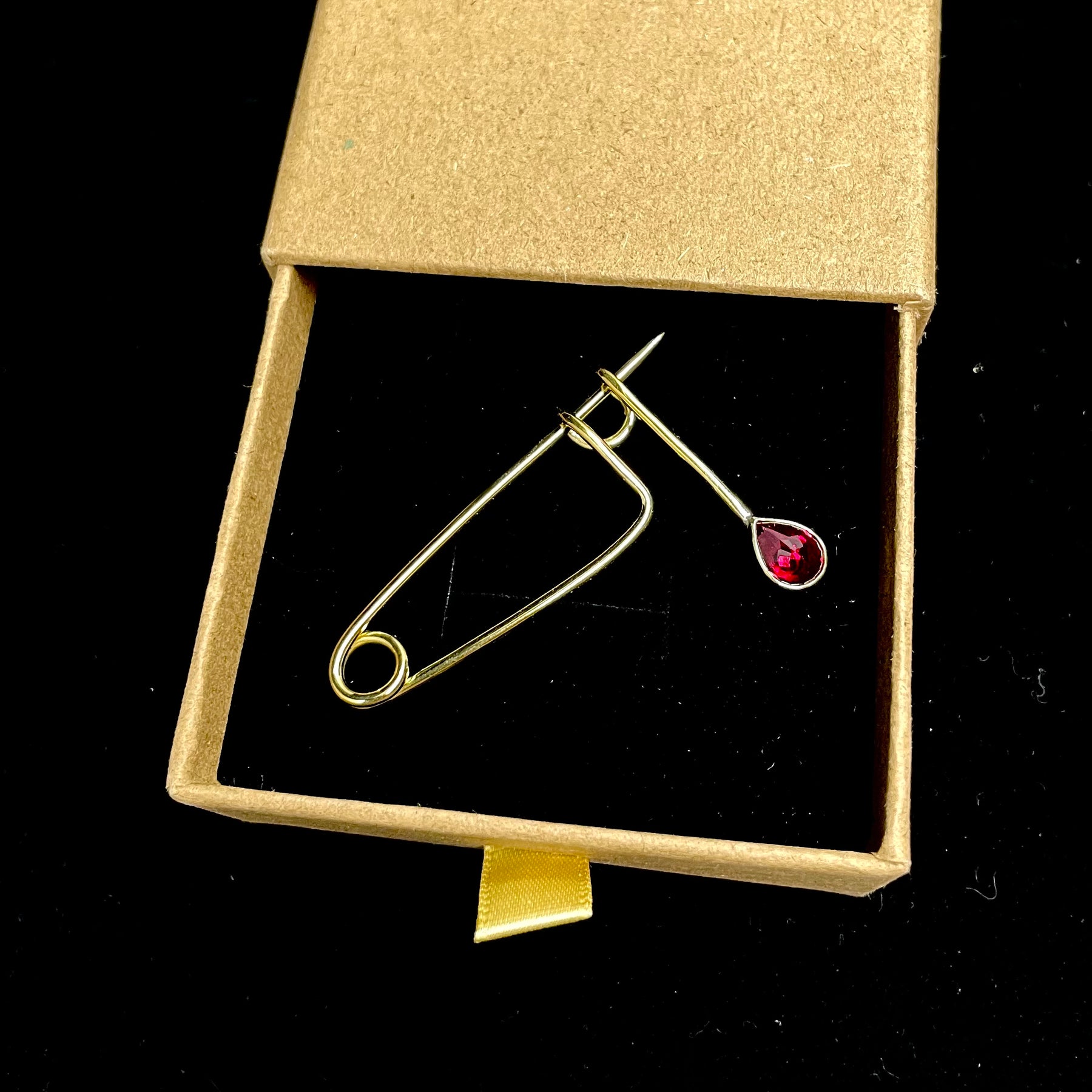 Brass and Ruby teardrop brooch