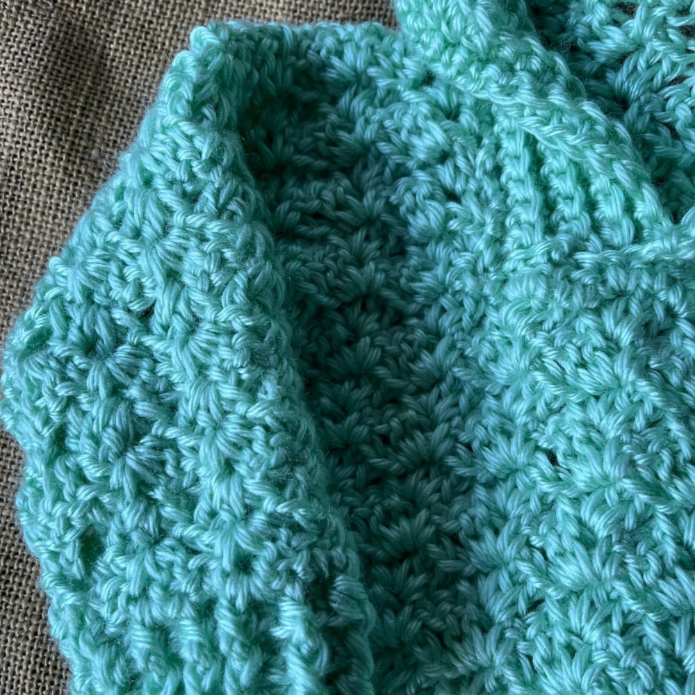 Handmade crochet baby jumper with collar
