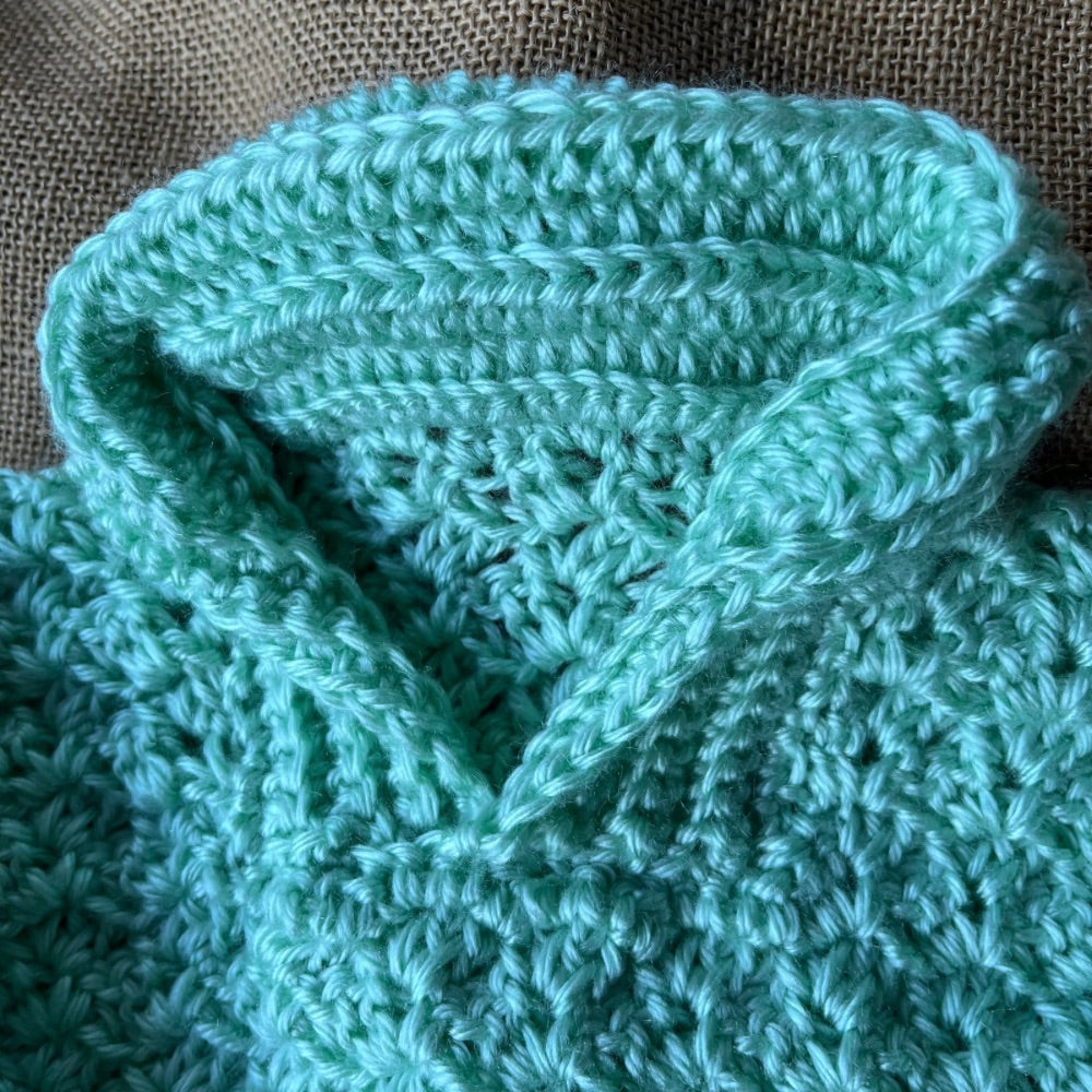 Handmade crochet baby jumper with collar