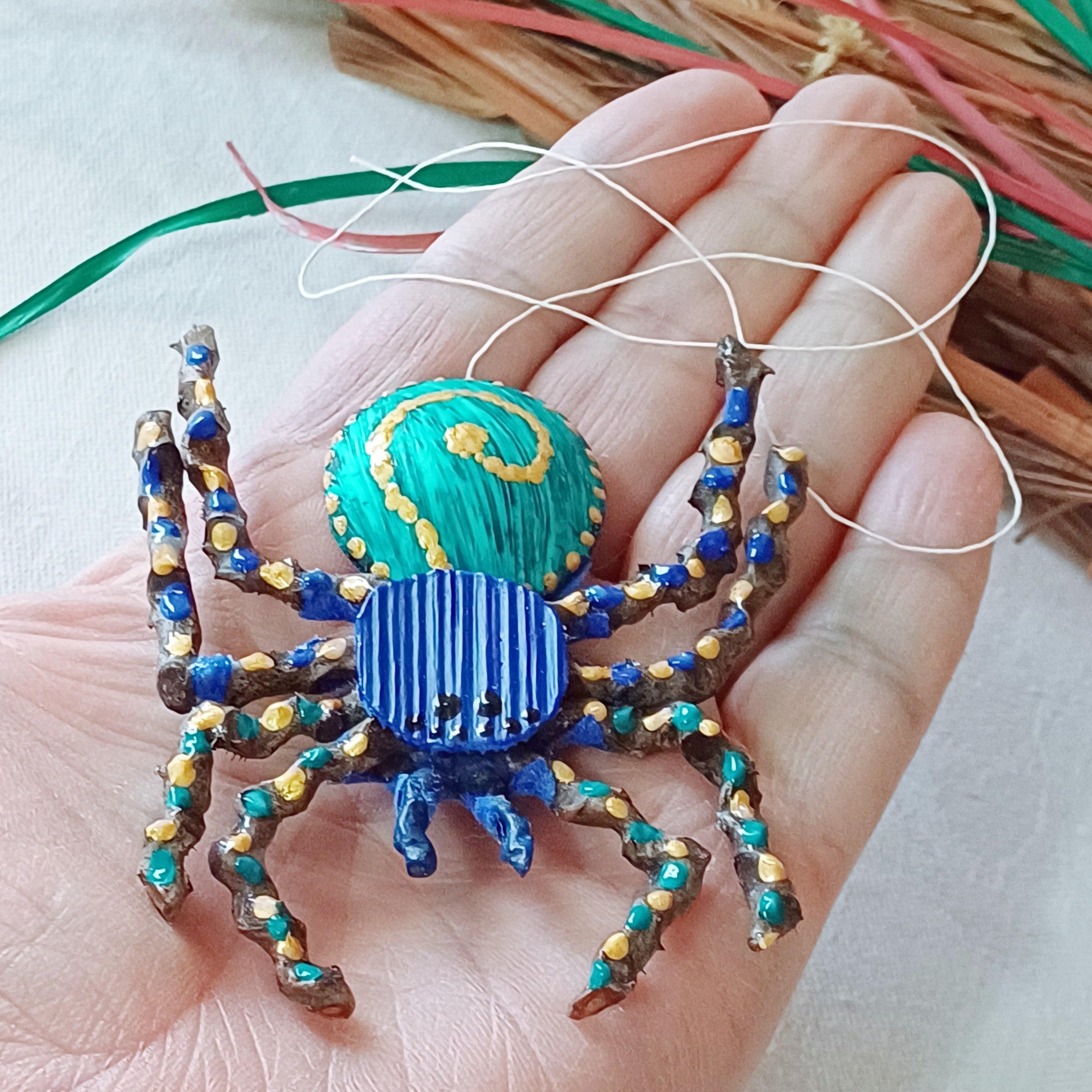 Palm spider keepsake - blue, teal, gold - magnet, thread - gift box - Handmade by Kantakoru