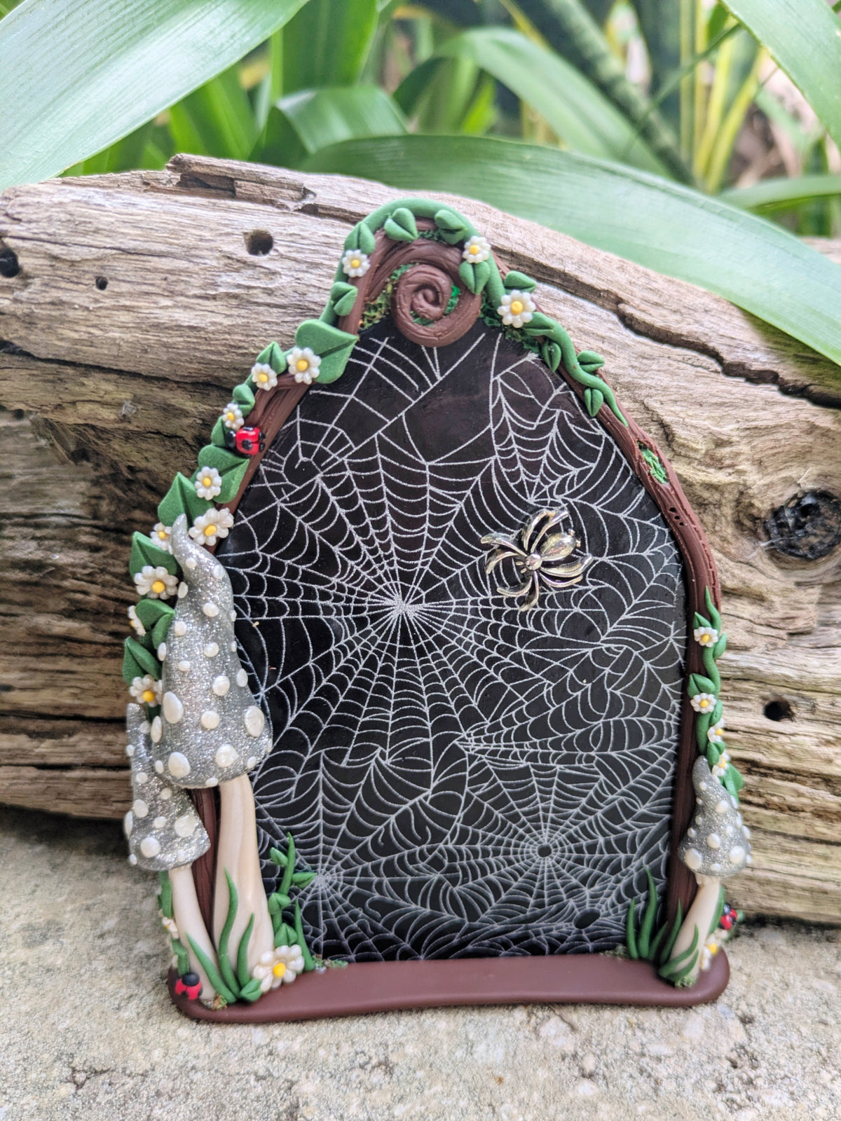 Spiderweb Forest Fairy door with glow in the dark mushrooms