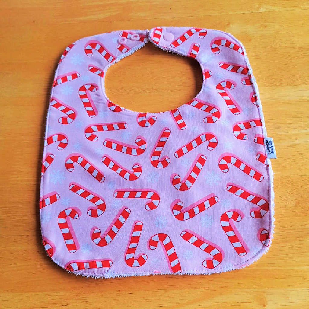Handmade Christmas Baby Bib – Candy Canes on Pink