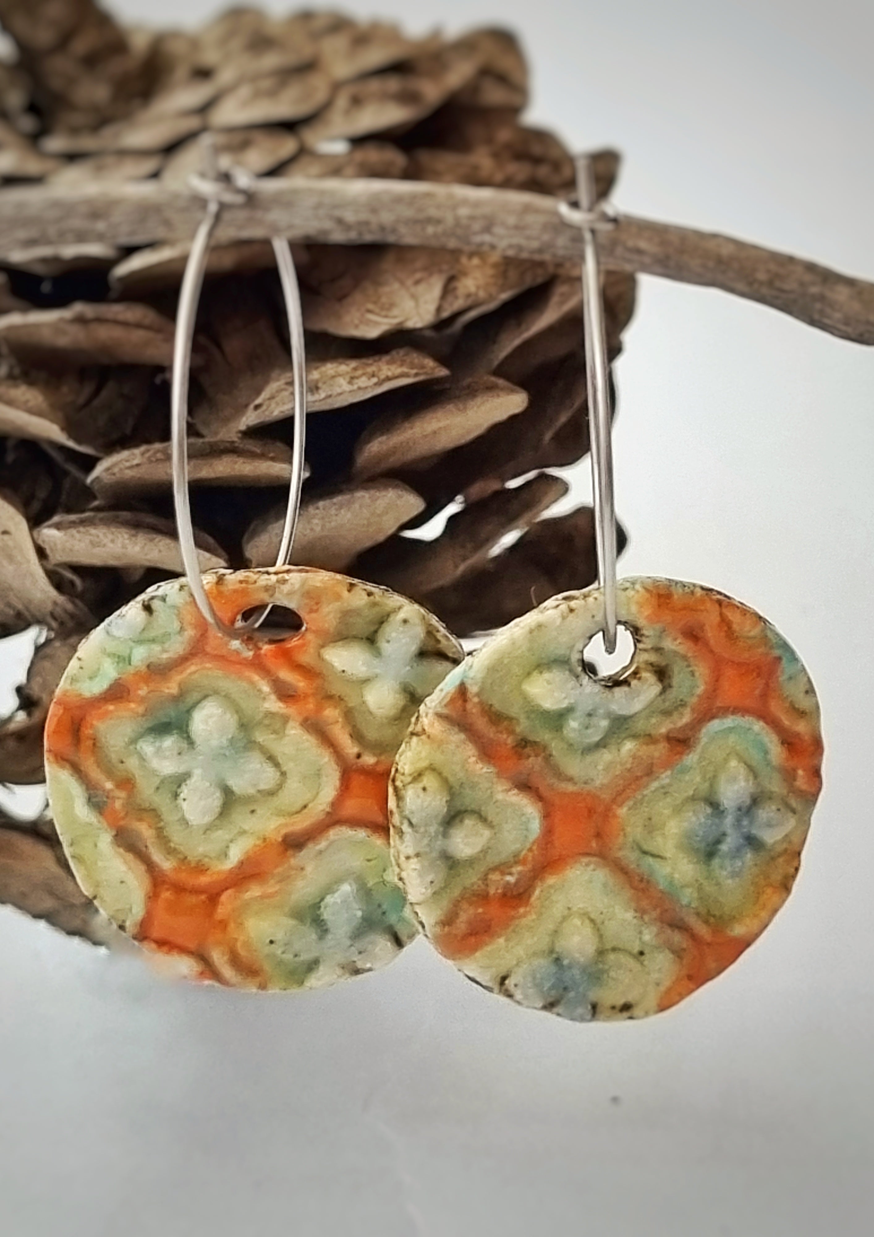 Handmade Stoneware Ceramic Earrings, orange multi-coloured, 28mm diameter, pierced ears