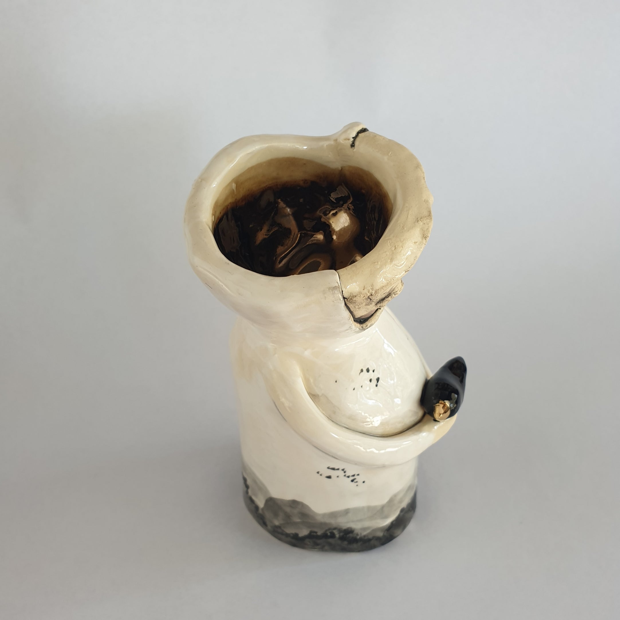 black and white clay character