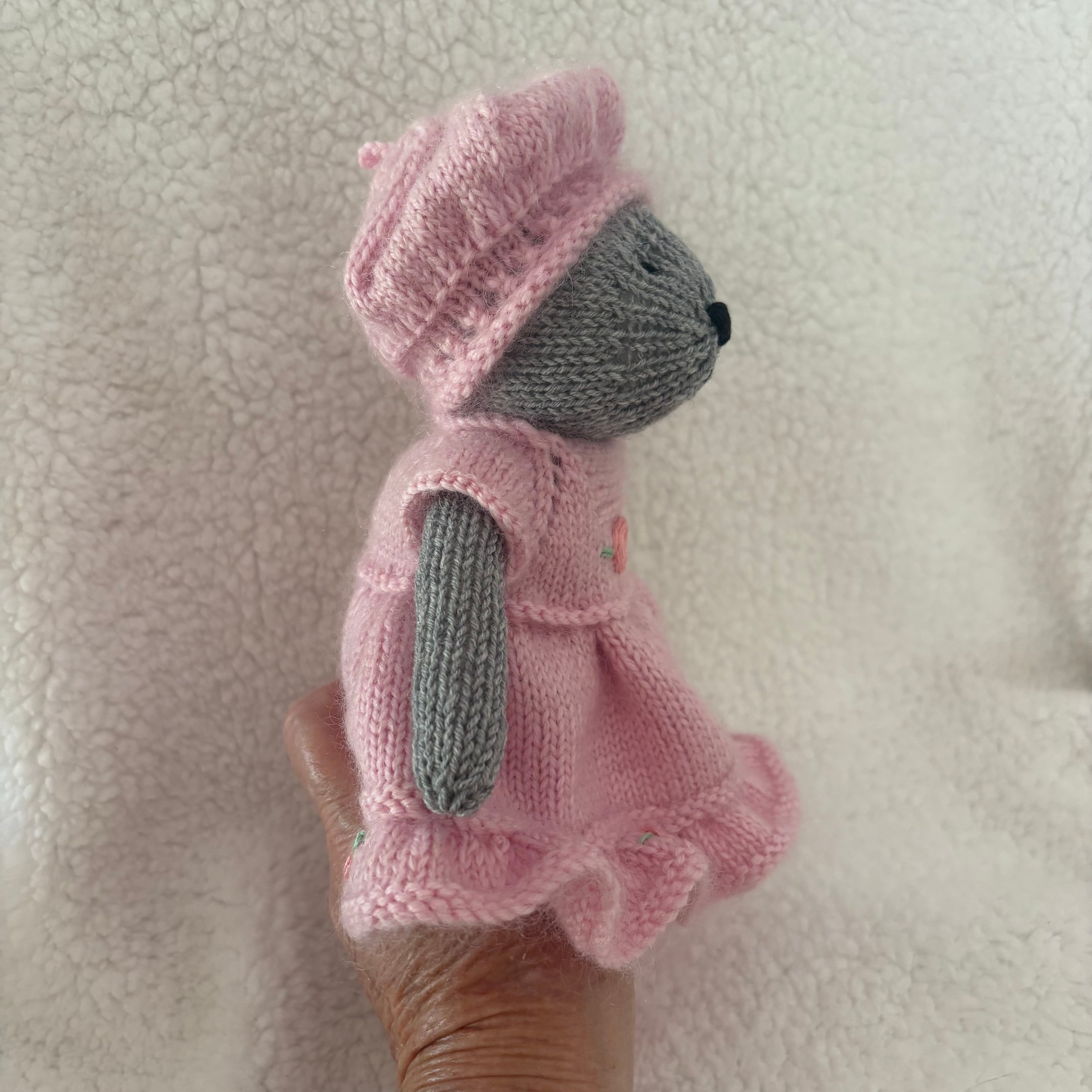 Little knitted bear in dress and beret
