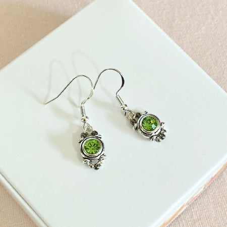 Green crystal and silver vintage style dangle earrings