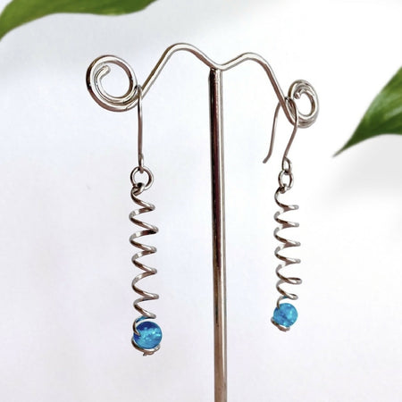 Spiralling dangle earrings in stainless steel