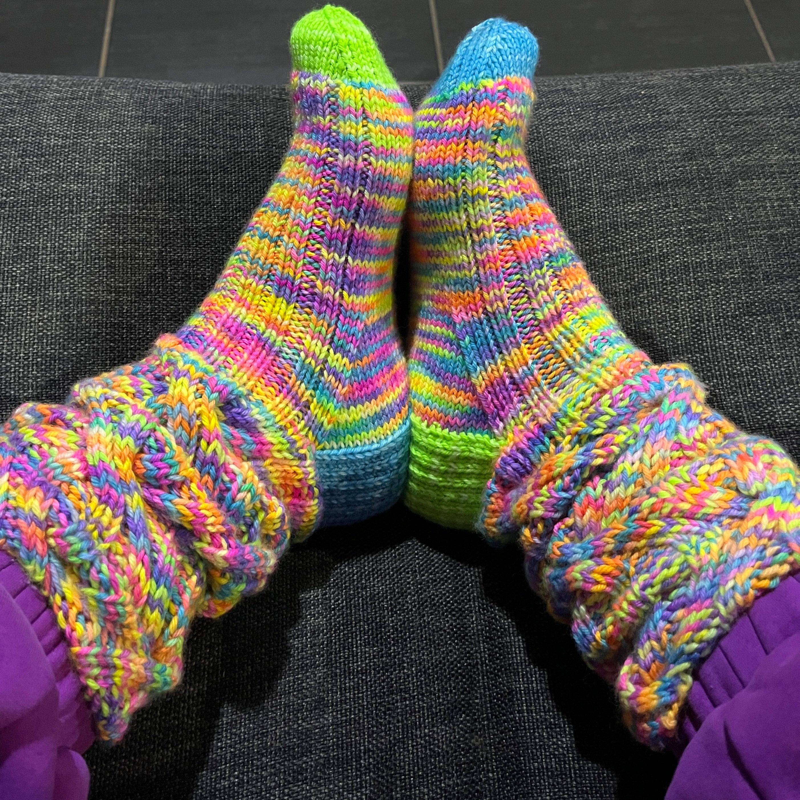 Hand knit neon cable slouch socks using Australian hand dyed yarn