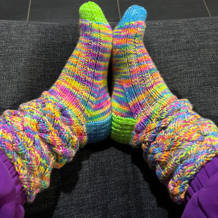 Hand knit neon cable slouch socks using Australian hand dyed yarn