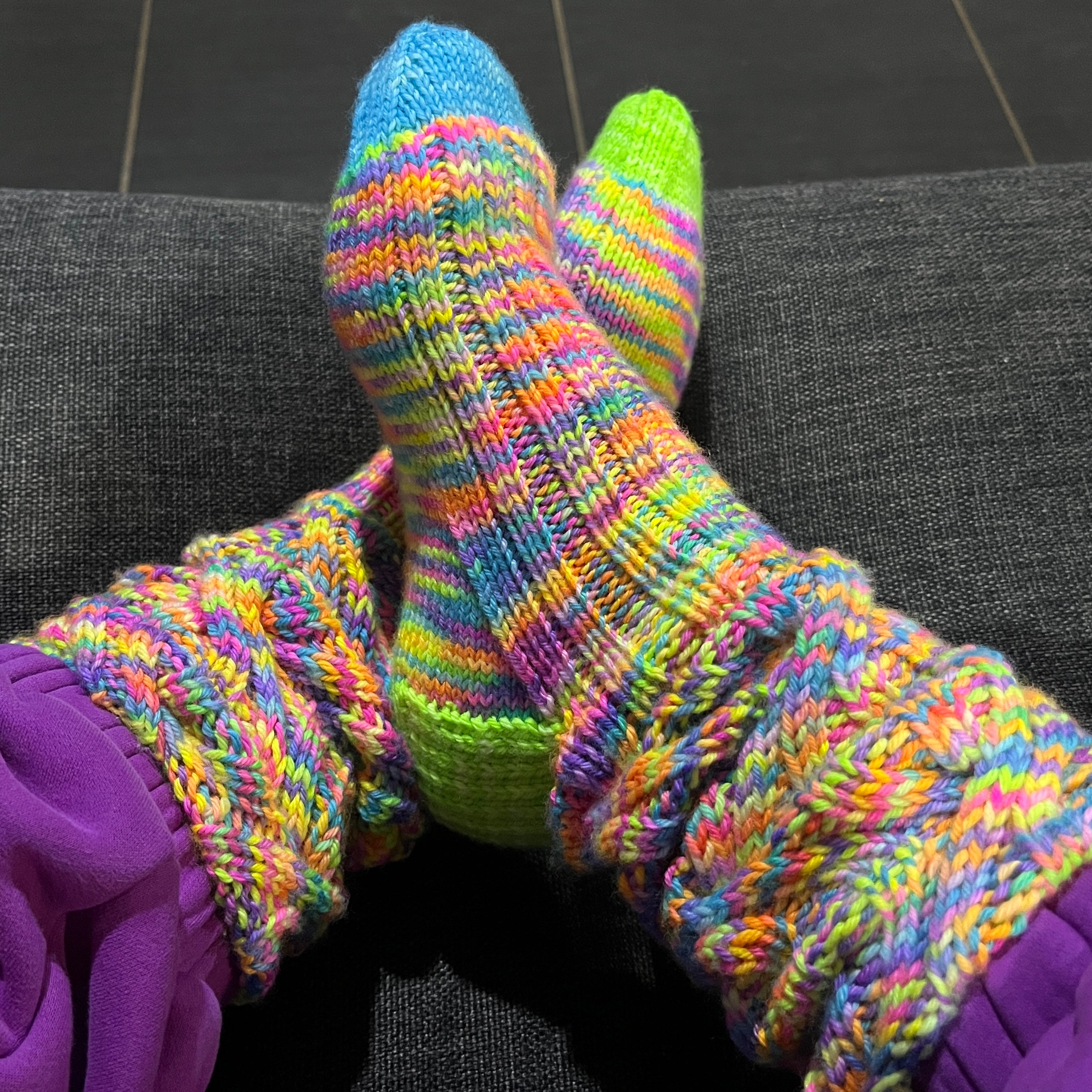 Hand knit neon cable slouch socks using Australian hand dyed yarn