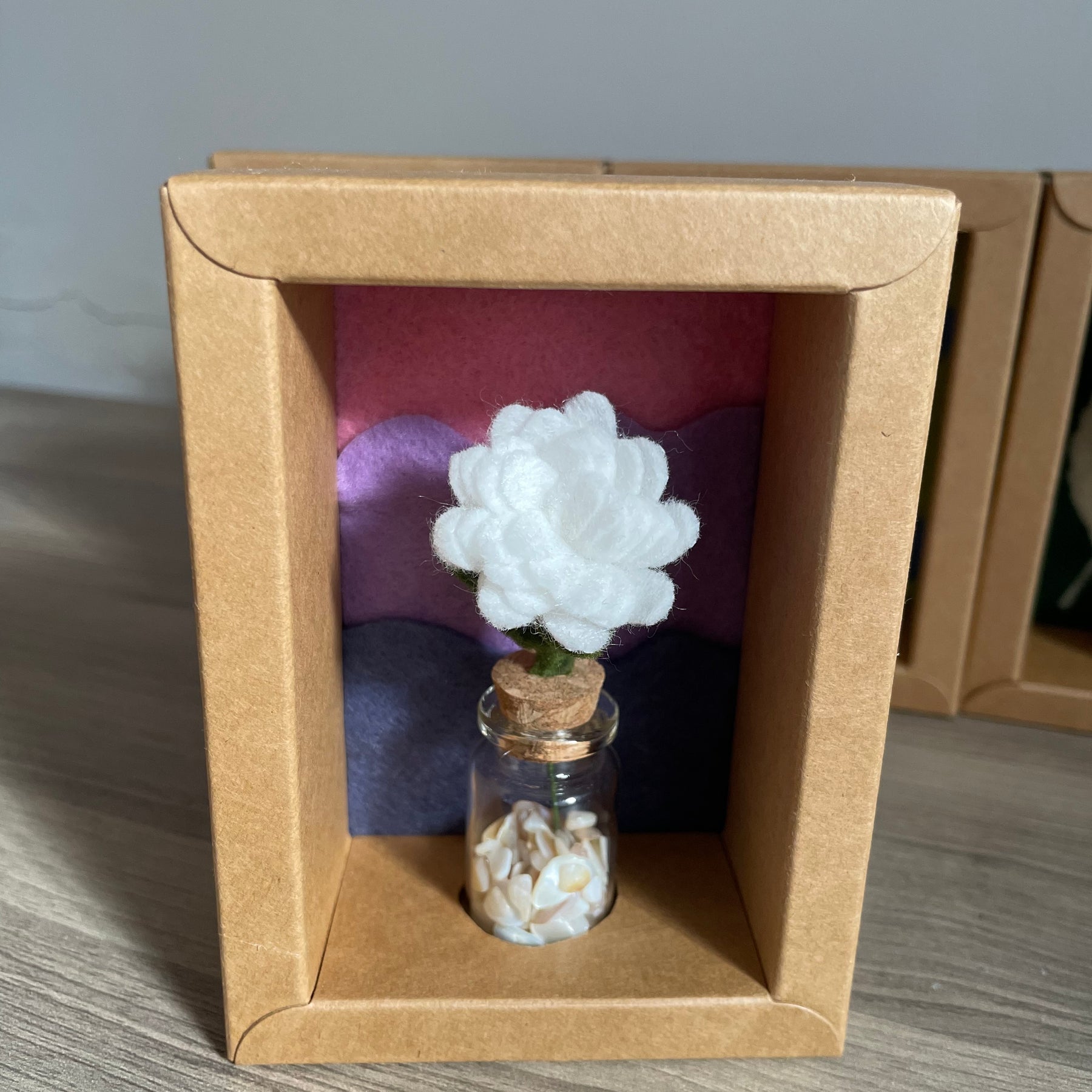 Minature flower in glass jar