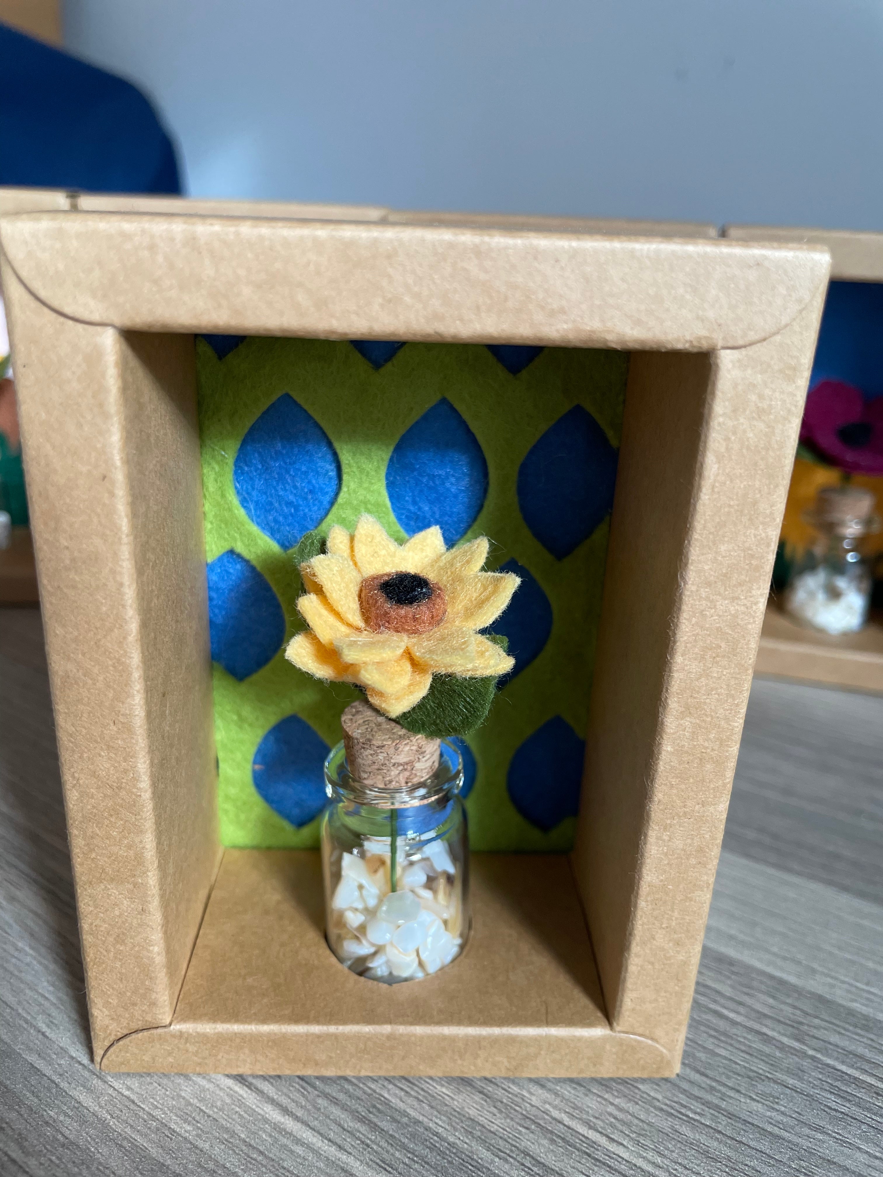 Minature flower in glass jar