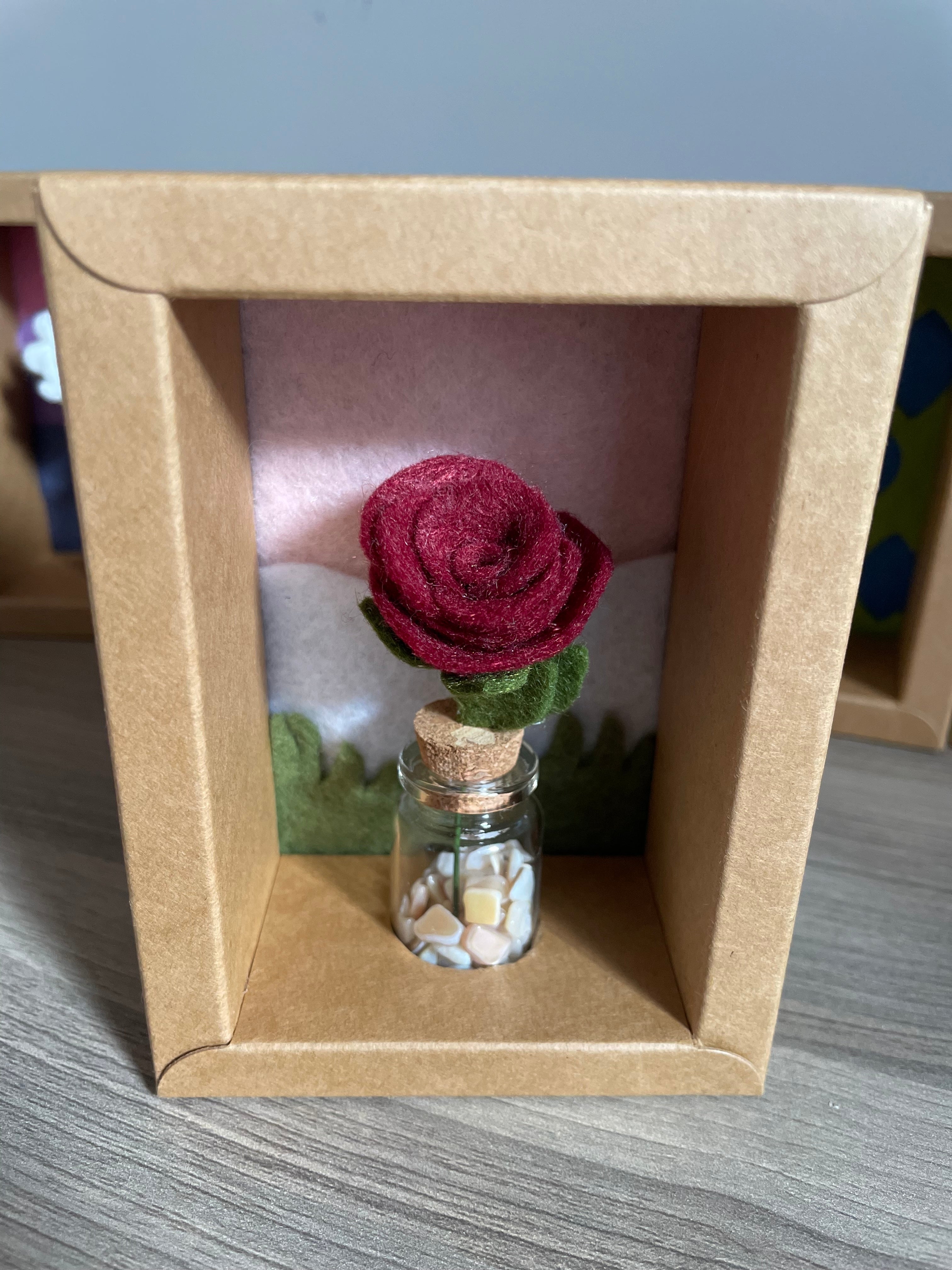 Minature flower in glass jar