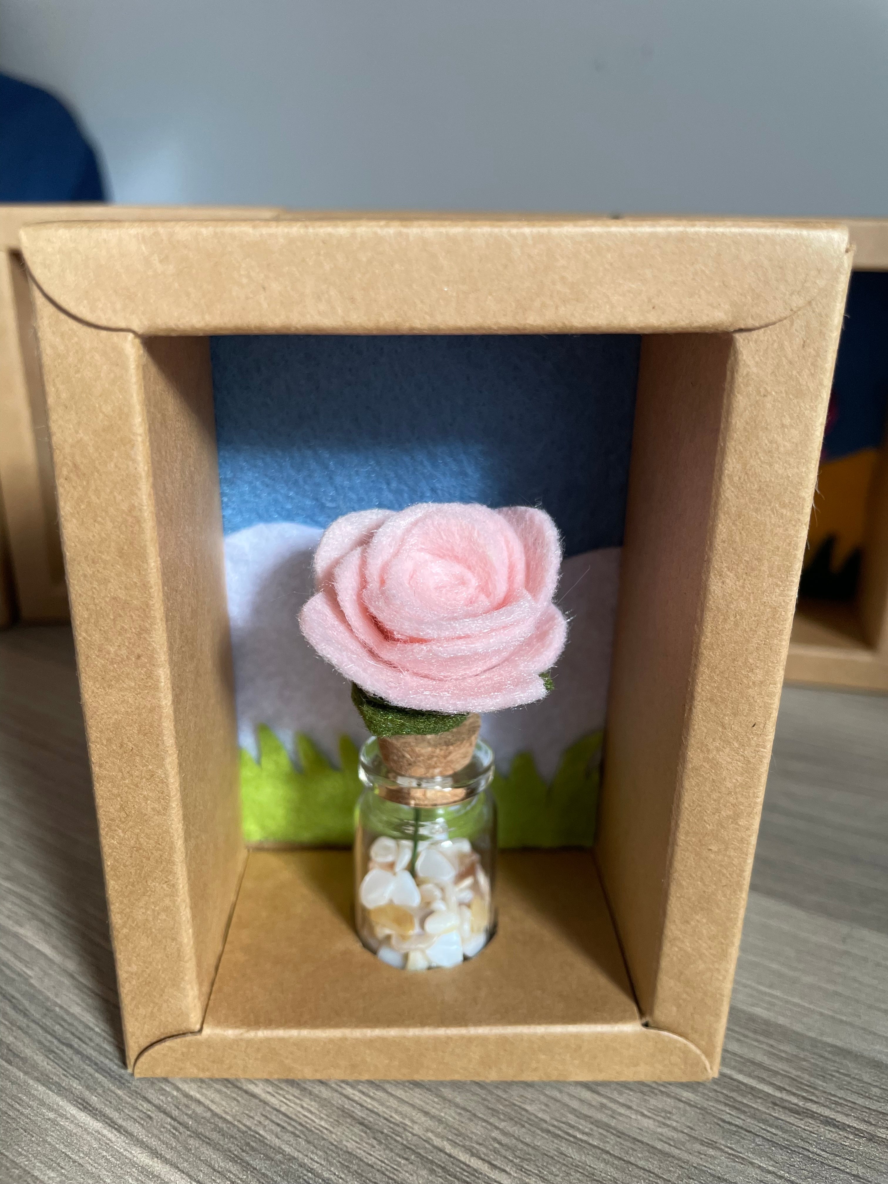 Minature flower in glass jar