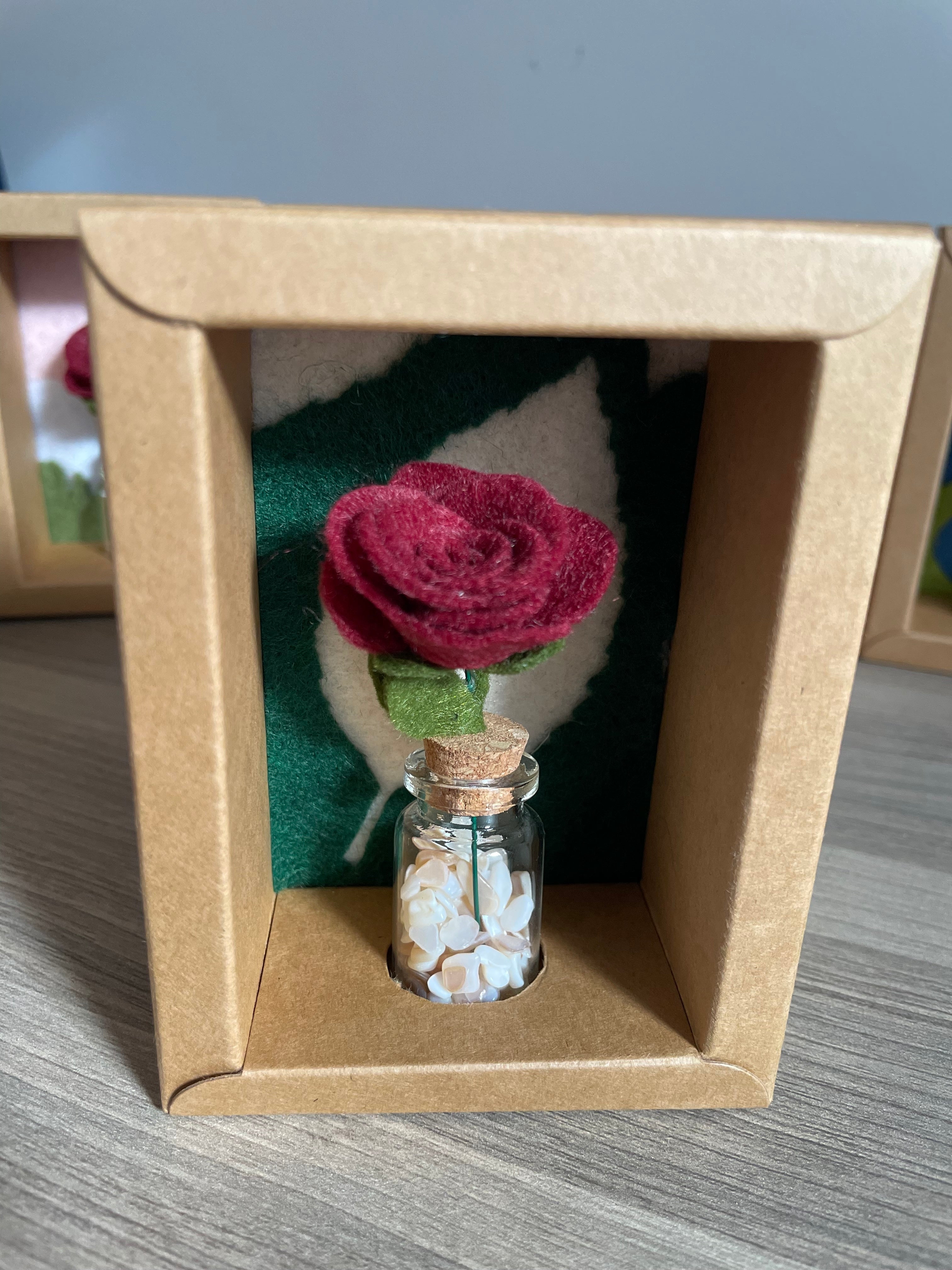 Minature flower in glass jar