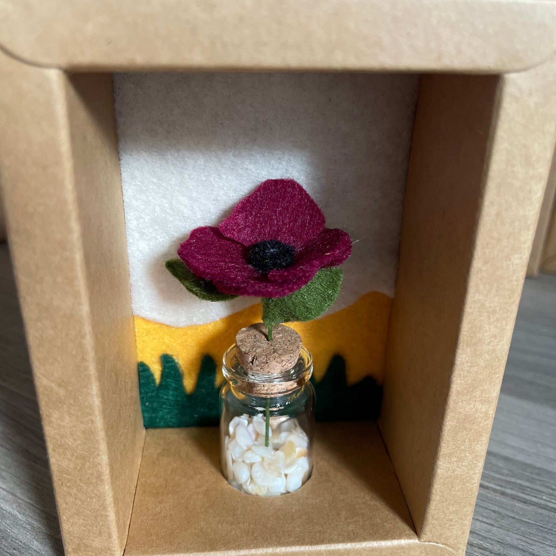 Minature flower in glass jar