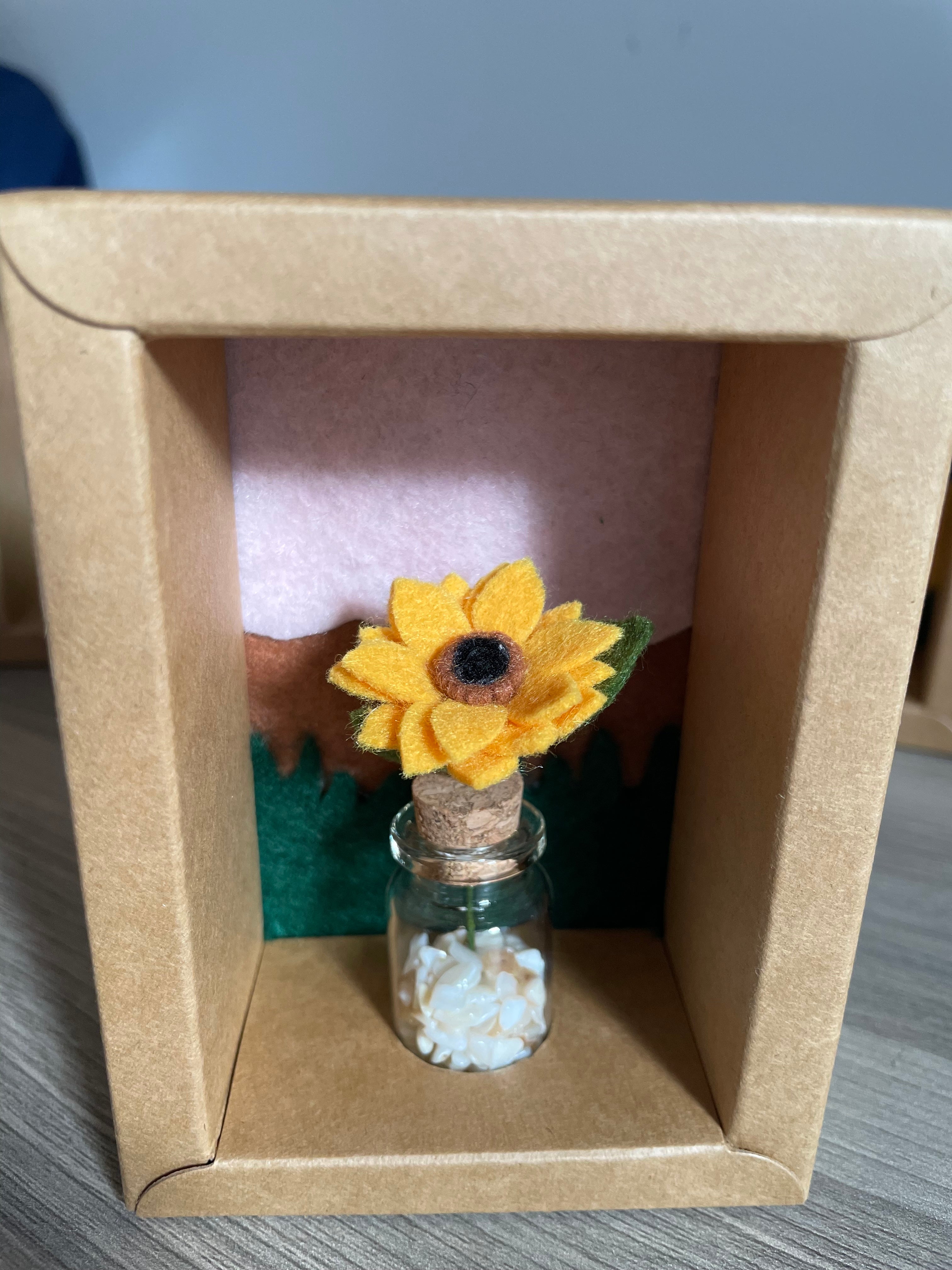Minature flower in glass jar