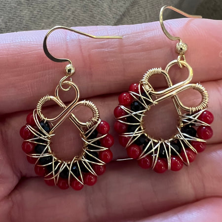 Gold onyx and red coral earrings