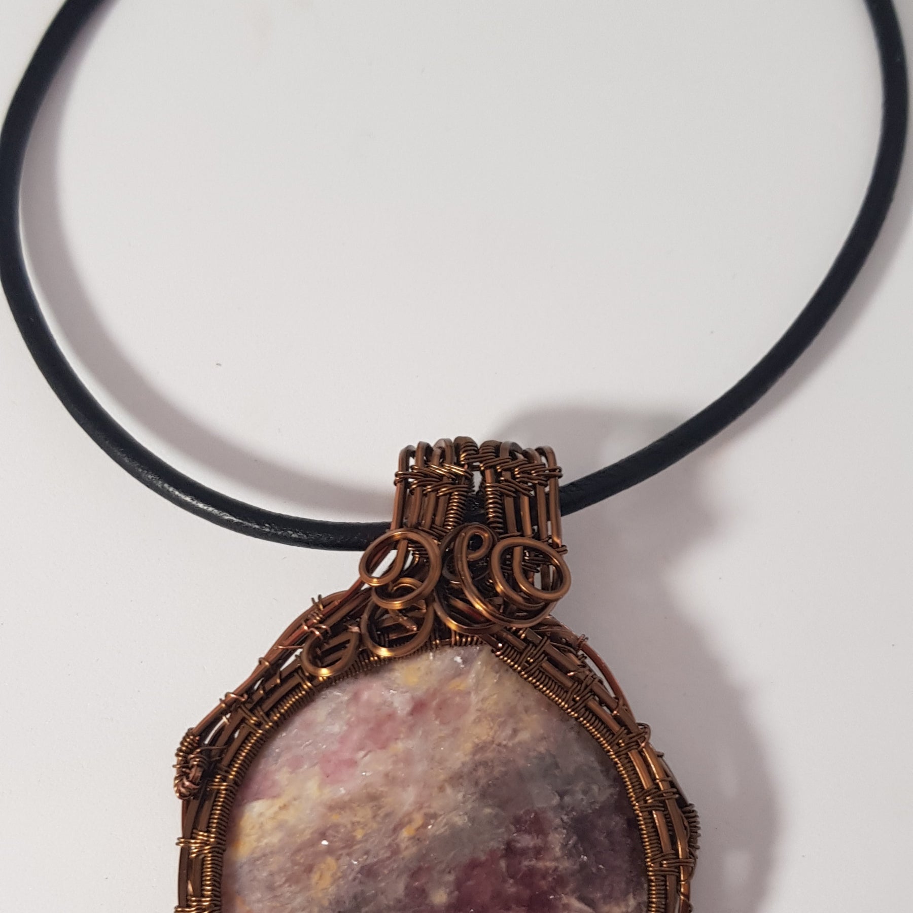 Wire wrapped Unicorn Pegmatite pendant,  #691 AM/N