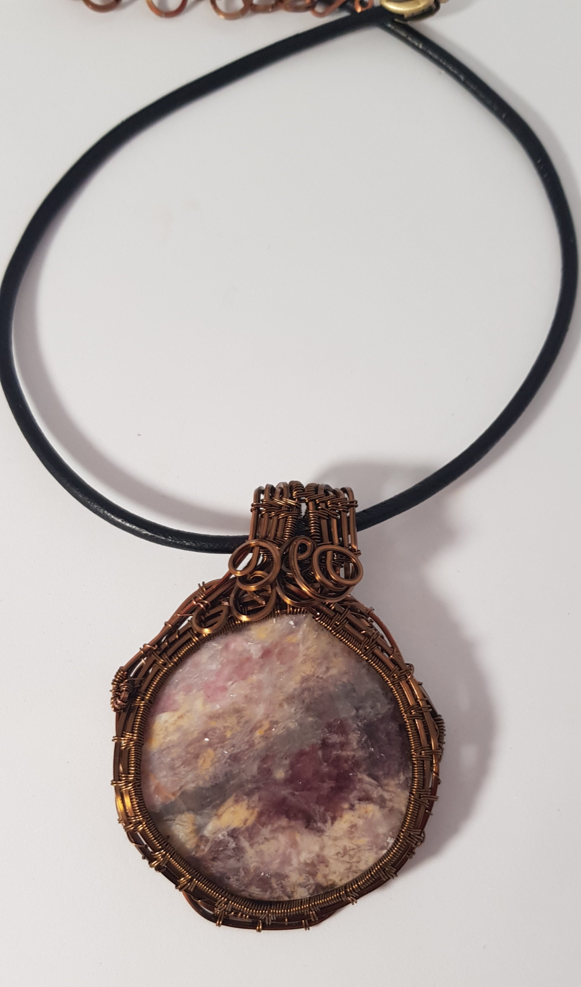 Wire wrapped Unicorn Pegmatite pendant,  #691 AM/N