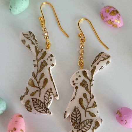 Sitting Bunnies with gold pattern