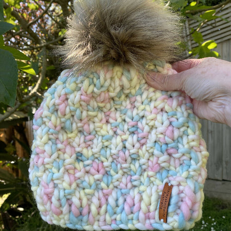 Hand knitted ladies rainbow PomPom beanie