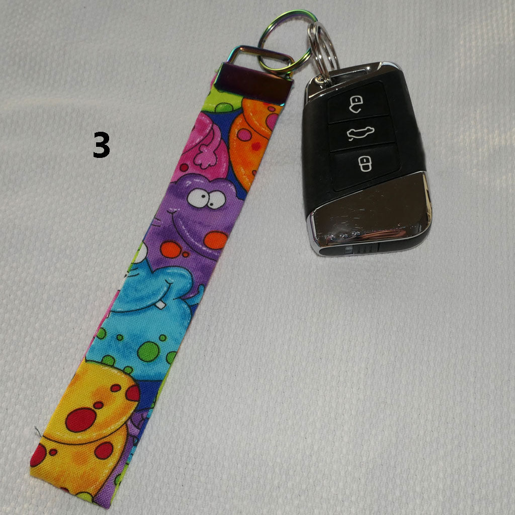 Key fobs. Handmade. Pretty fabrics, bright colours.