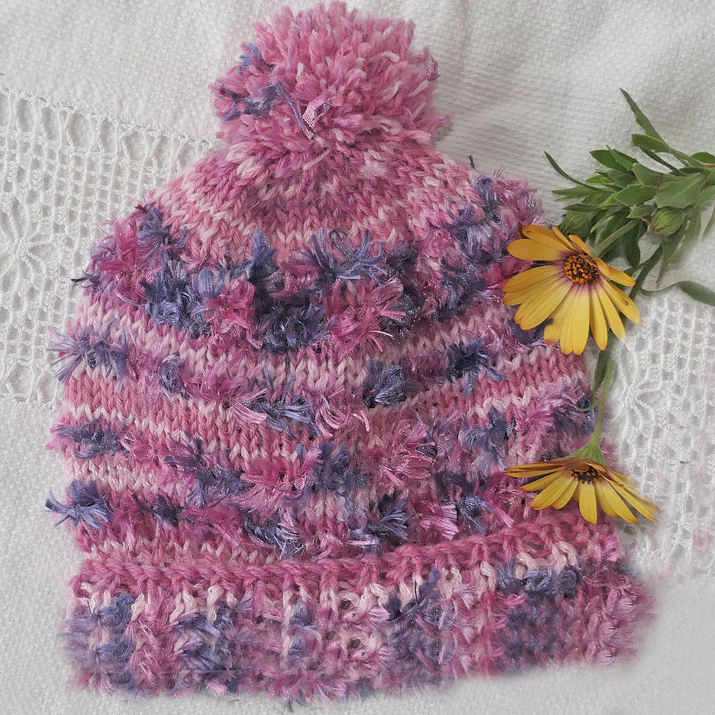 Beanies. Pink or blue beanies for babies and toddlers.