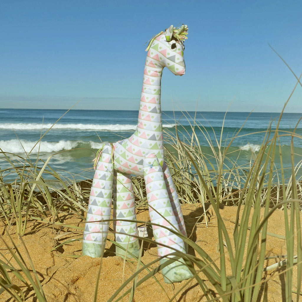 Soft toy giraffes frollicking at the Beach. Hand made.