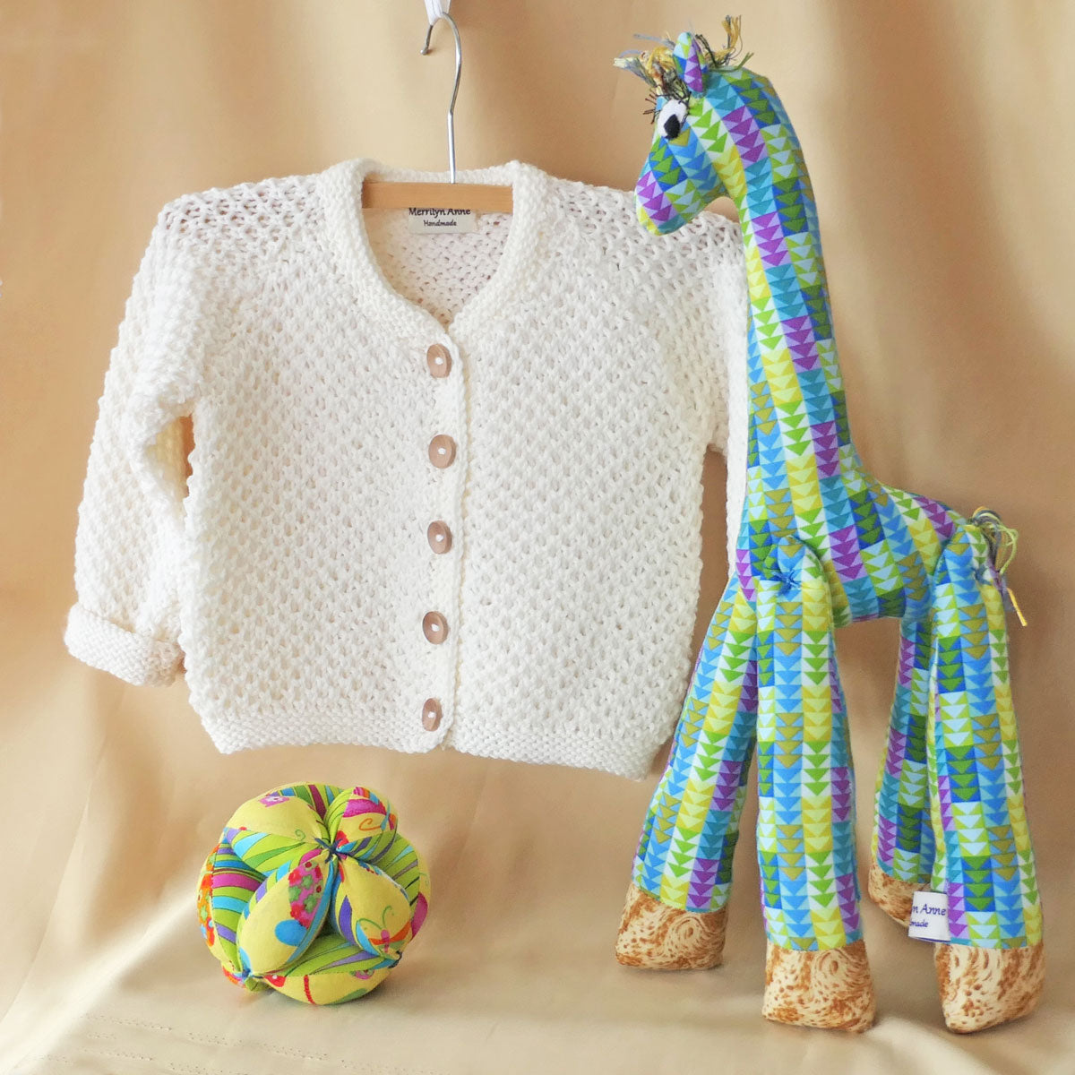 Cardigan size 2-3. Add a giraffe or ball