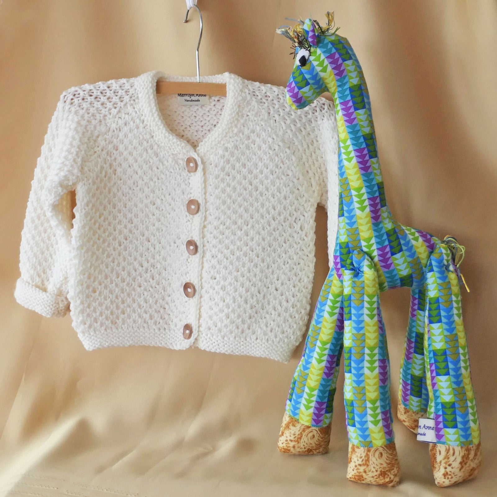 Cardigan size 2-3. Add a giraffe or ball