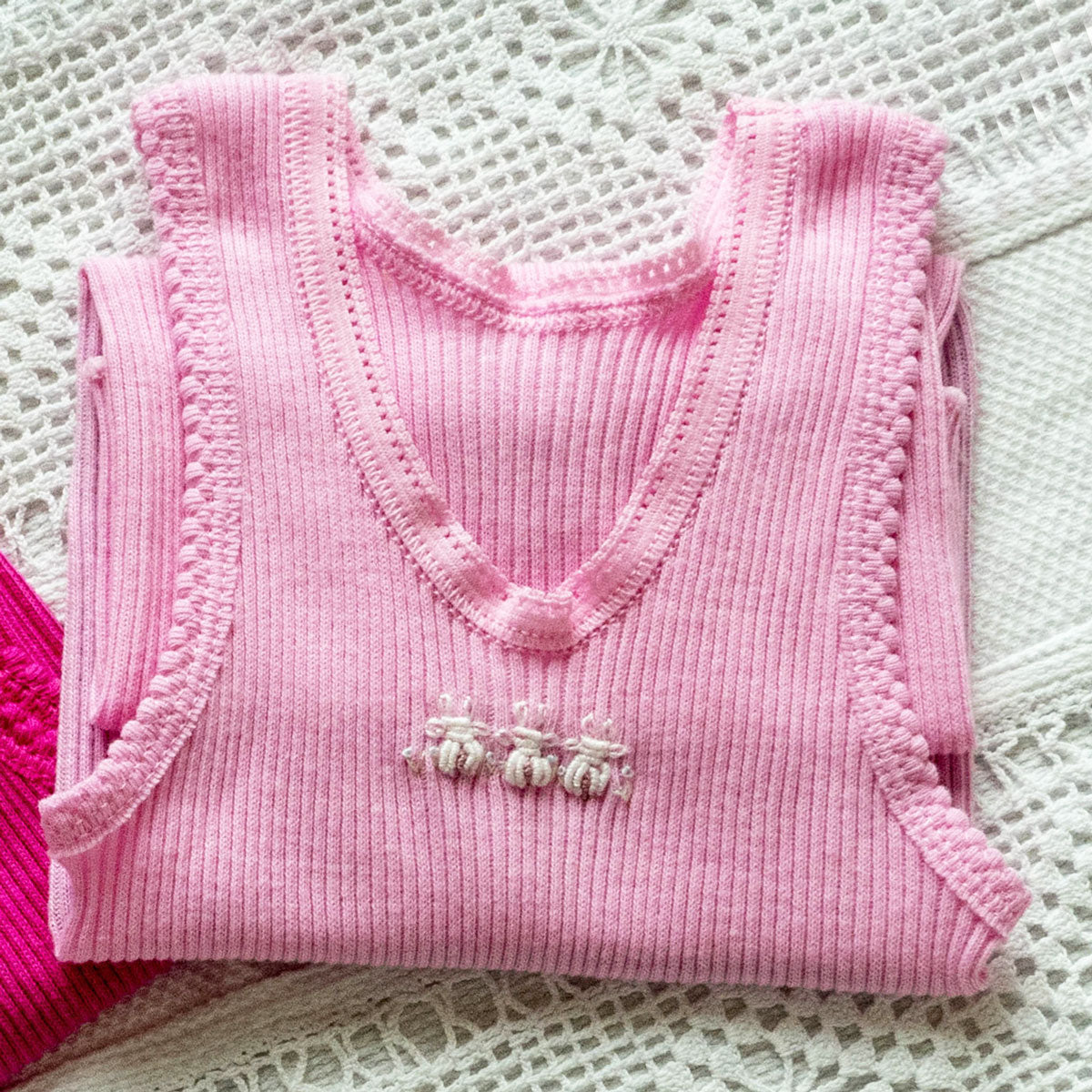 Singlets, hand embroidered for babies.  Free post.
