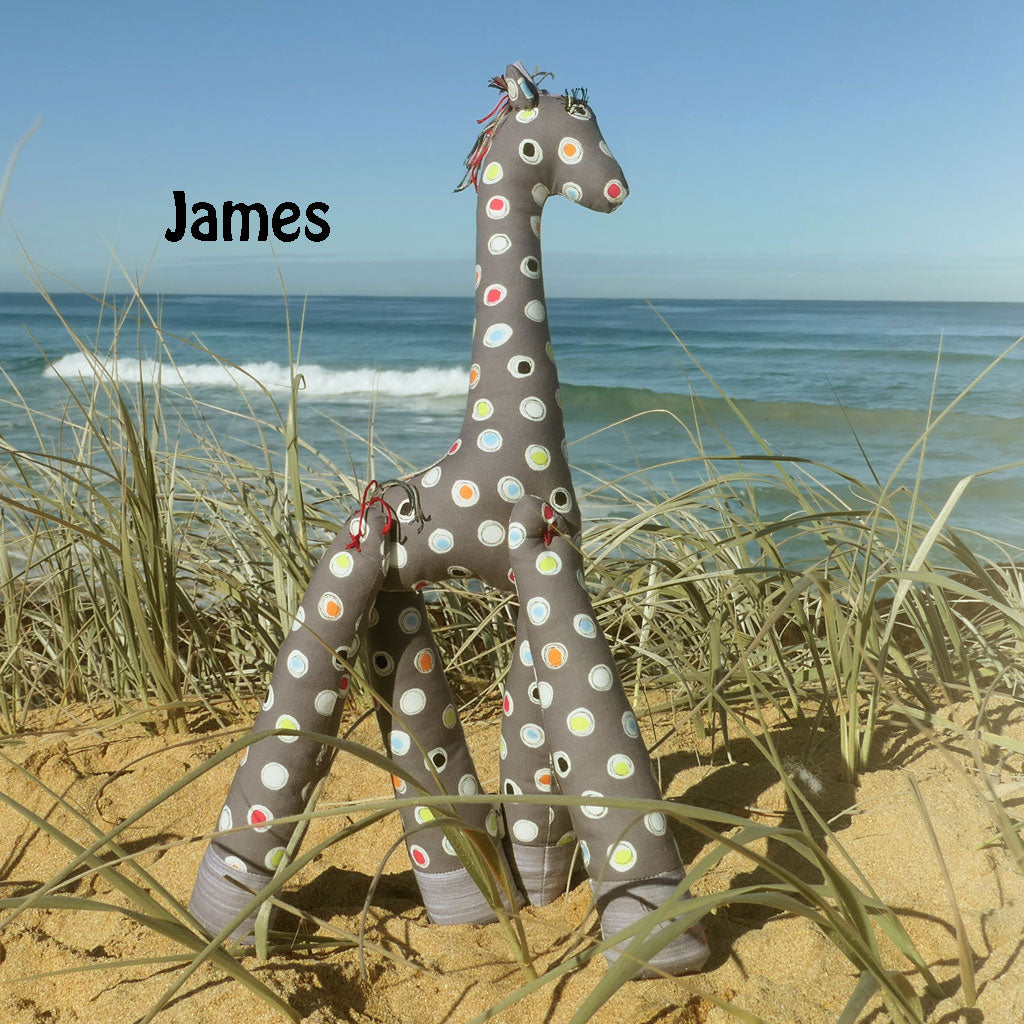 Soft toy giraffes frollicking at the Beach. Hand made.