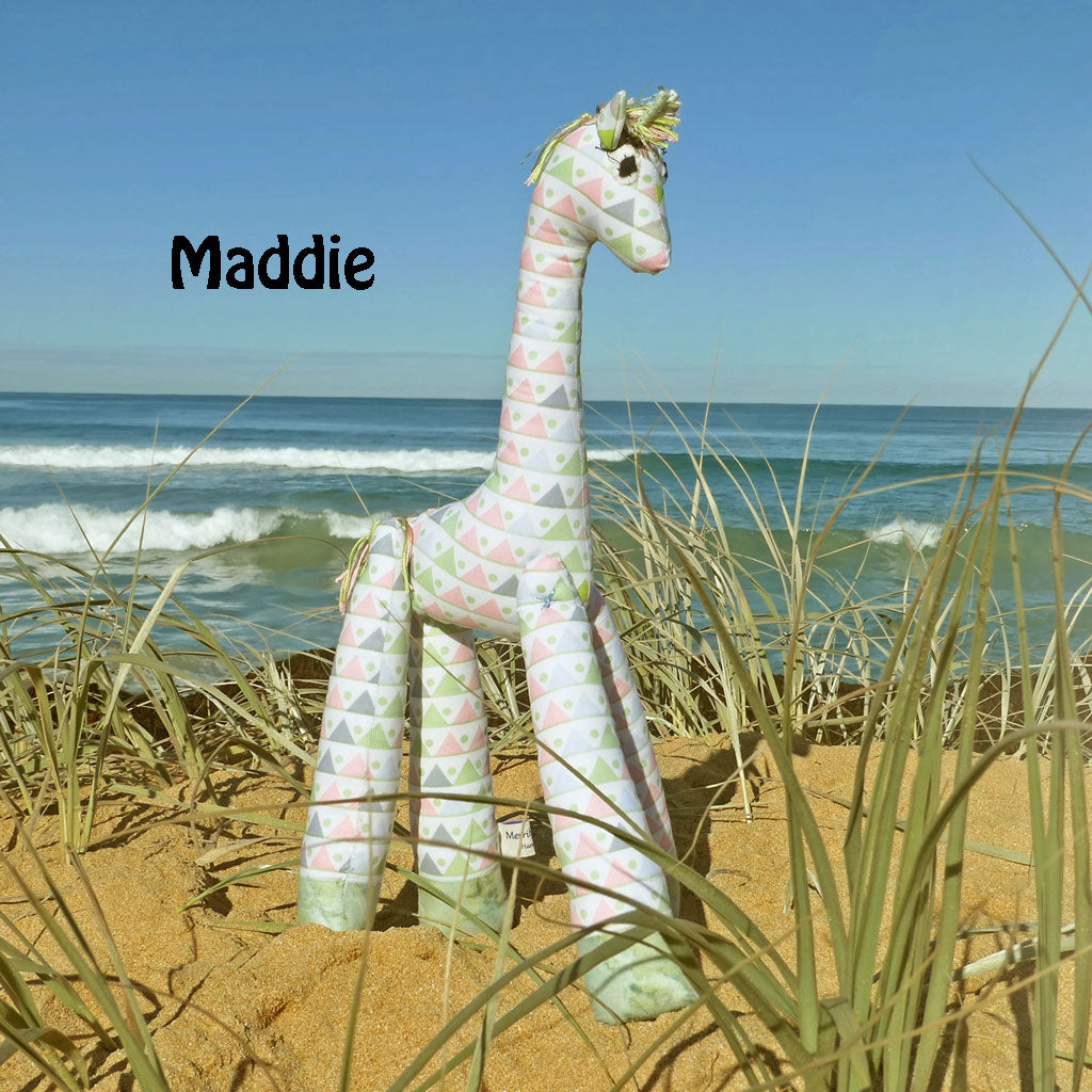 Soft toy giraffes frollicking at the Beach. Hand made.