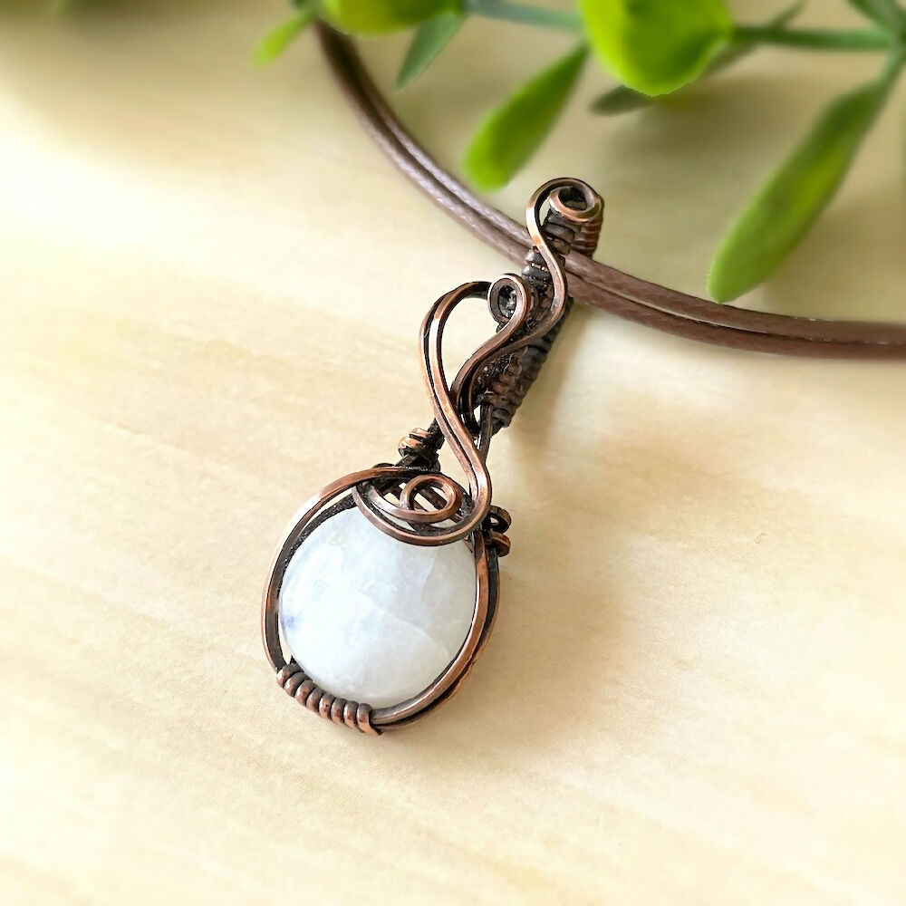 Captivating 47x17mm Wire-Wrapped Rainbow Moonstone Pendant