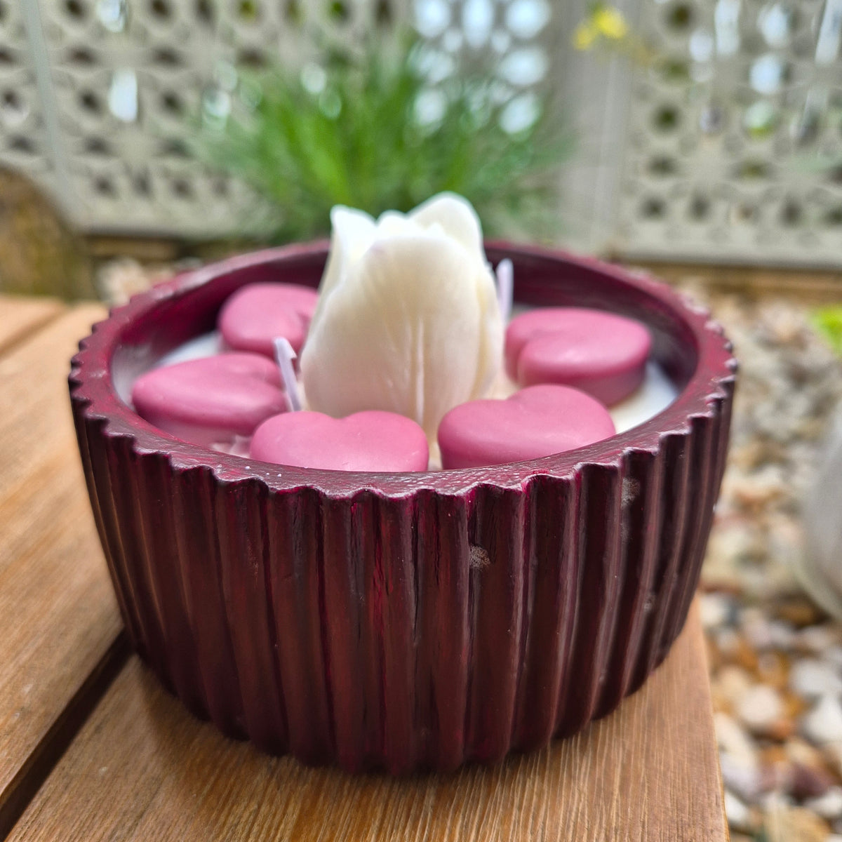 Round burgundy concrete bowl candle with tulip flower