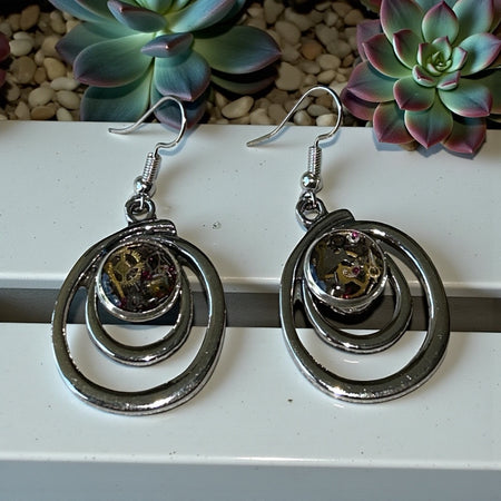 Steampunk watch parts swirly earrings