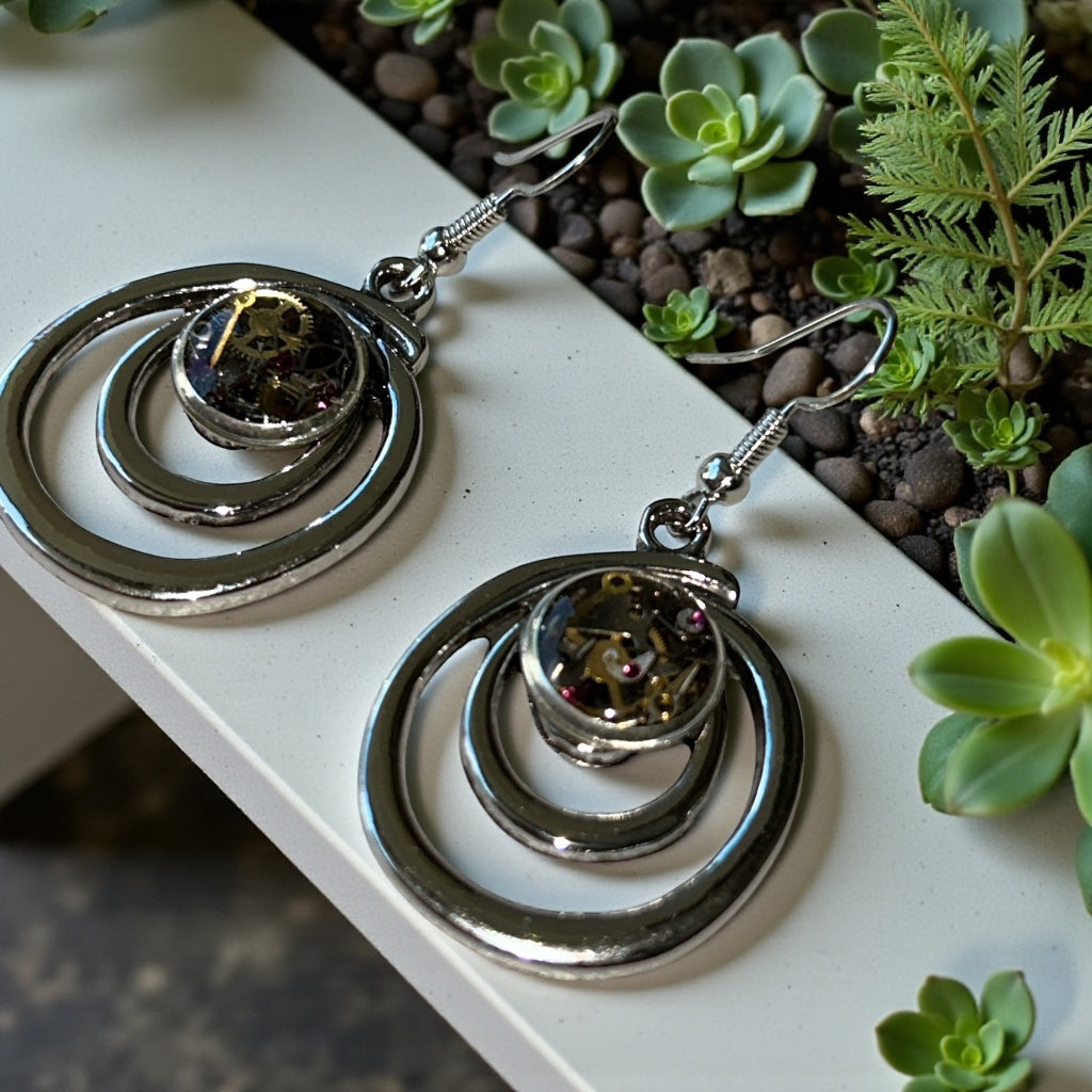 Steampunk watch parts swirly earrings