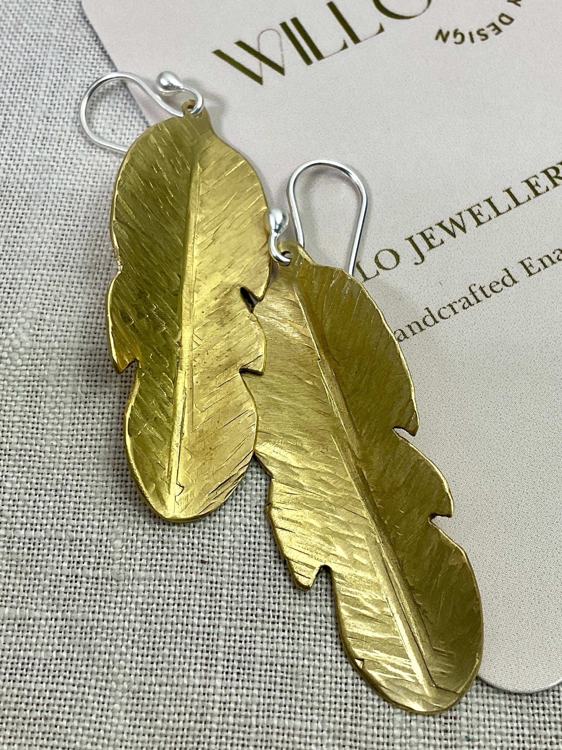 Brass leaf earrings.