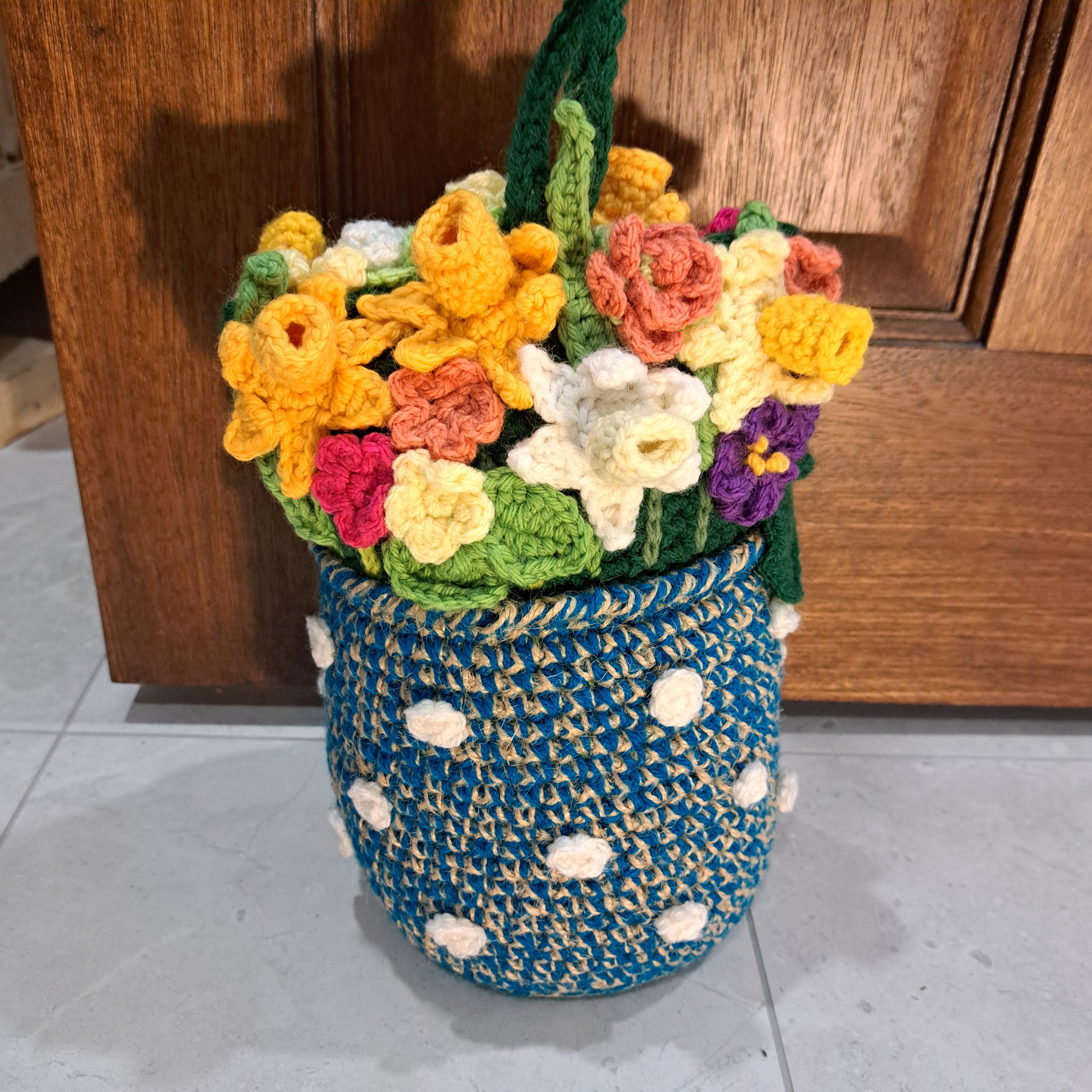 Handmade Crochet flower vase doorstop, rustic jute, cotton, wool spring flowers blue vase