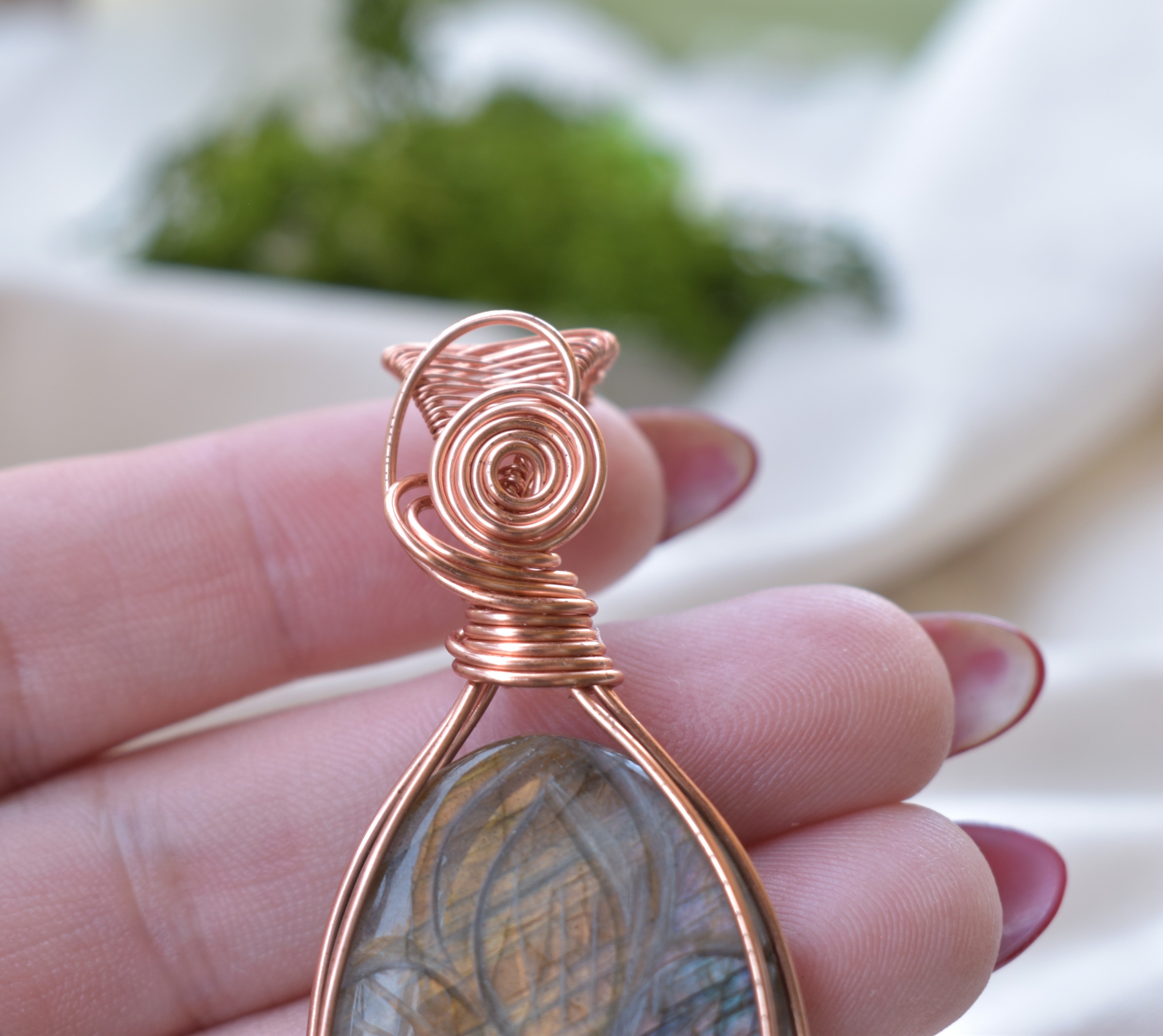 Ancient Bloom – Handcrafted Carved Labradorite Pendant