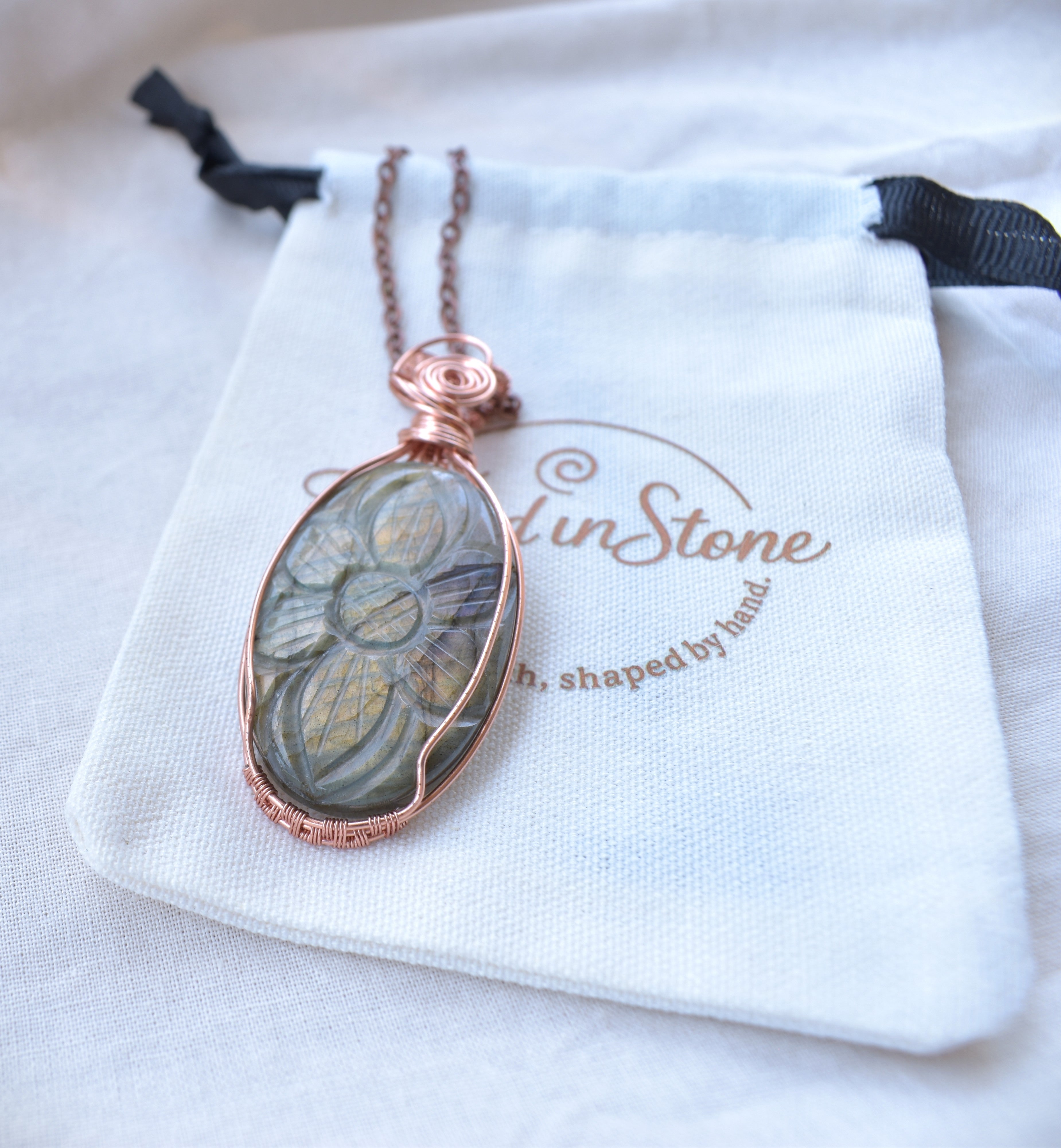 Ancient Bloom – Handcrafted Carved Labradorite Pendant