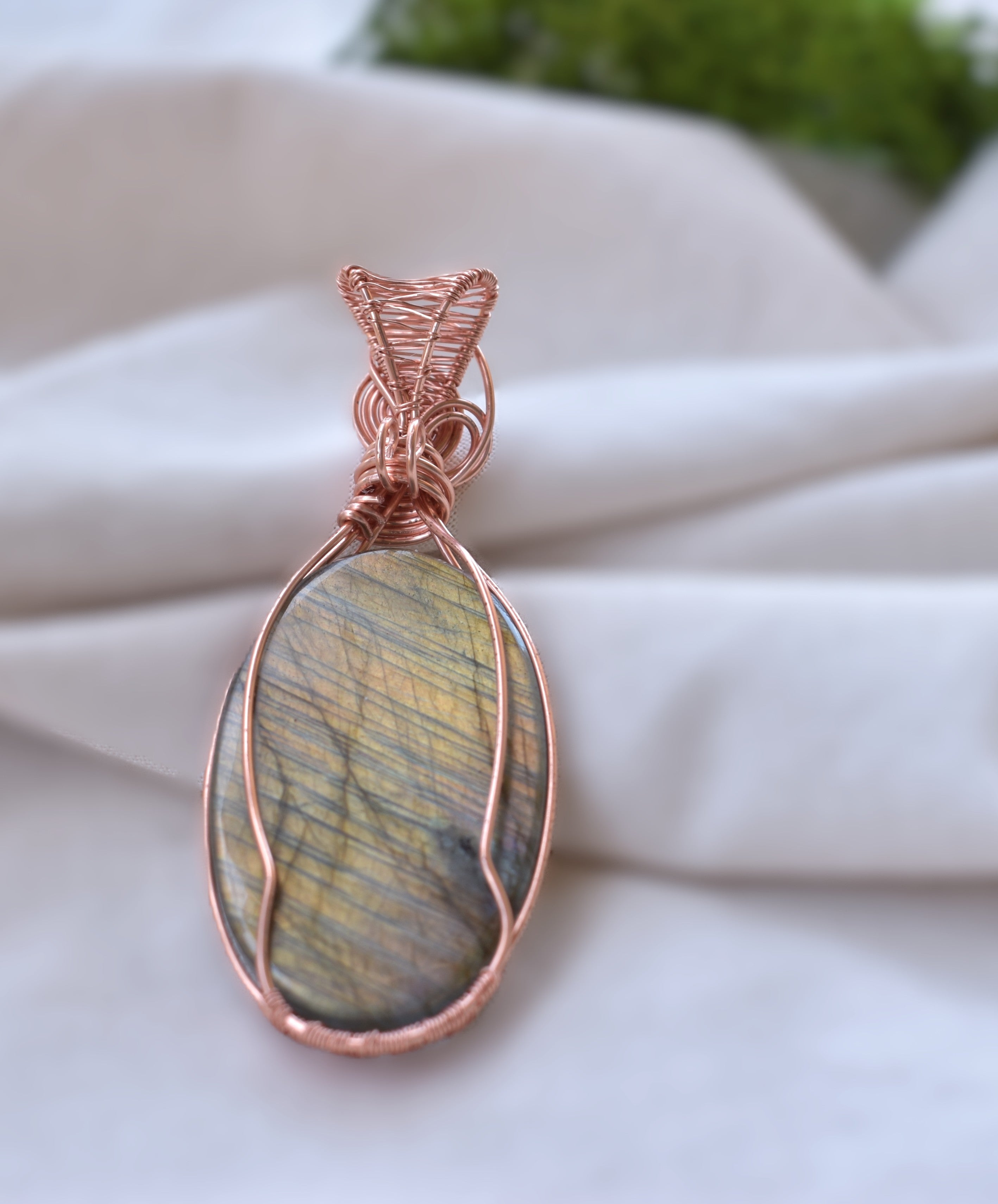 Ancient Bloom – Handcrafted Carved Labradorite Pendant