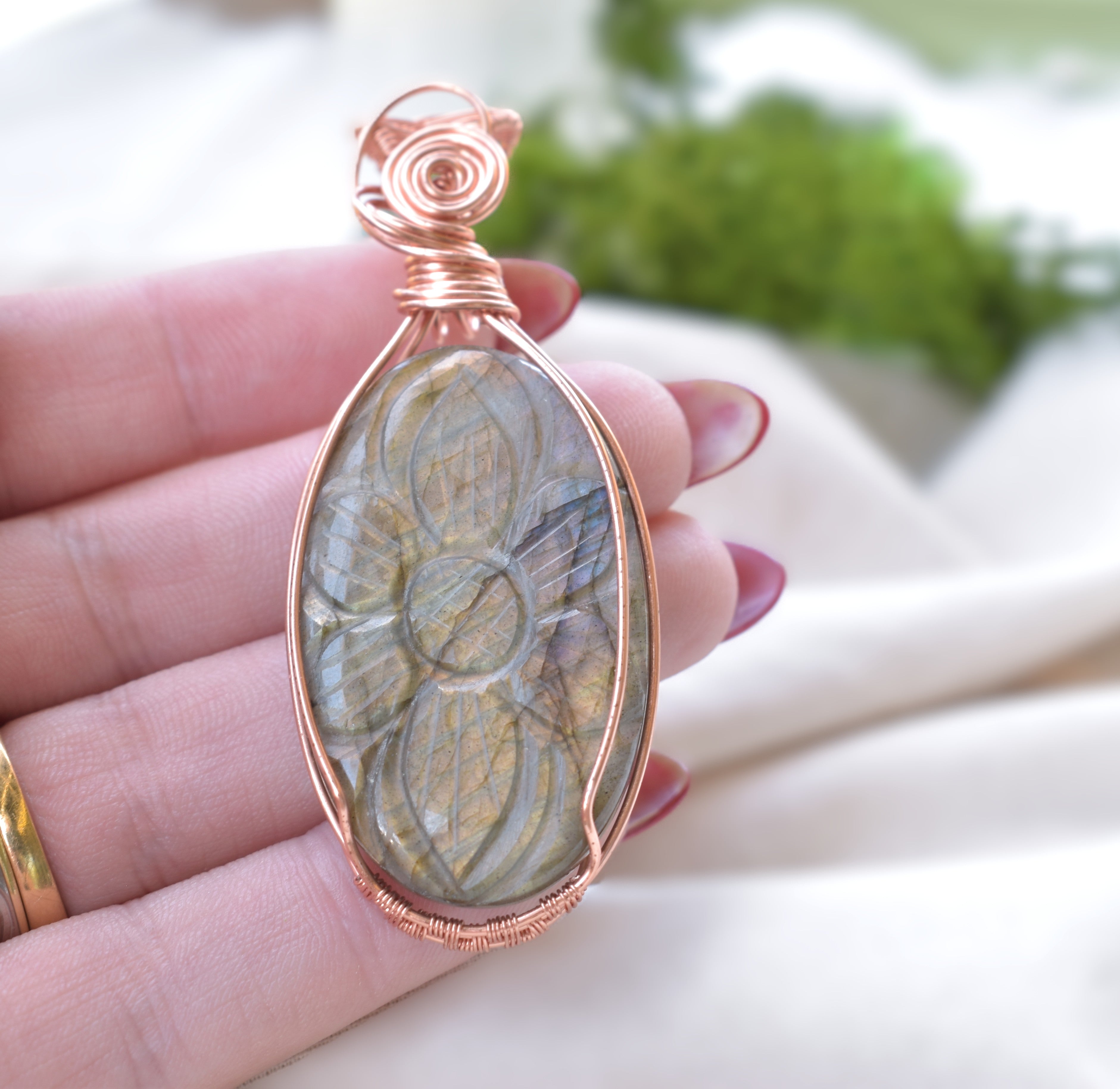 Ancient Bloom – Handcrafted Carved Labradorite Pendant