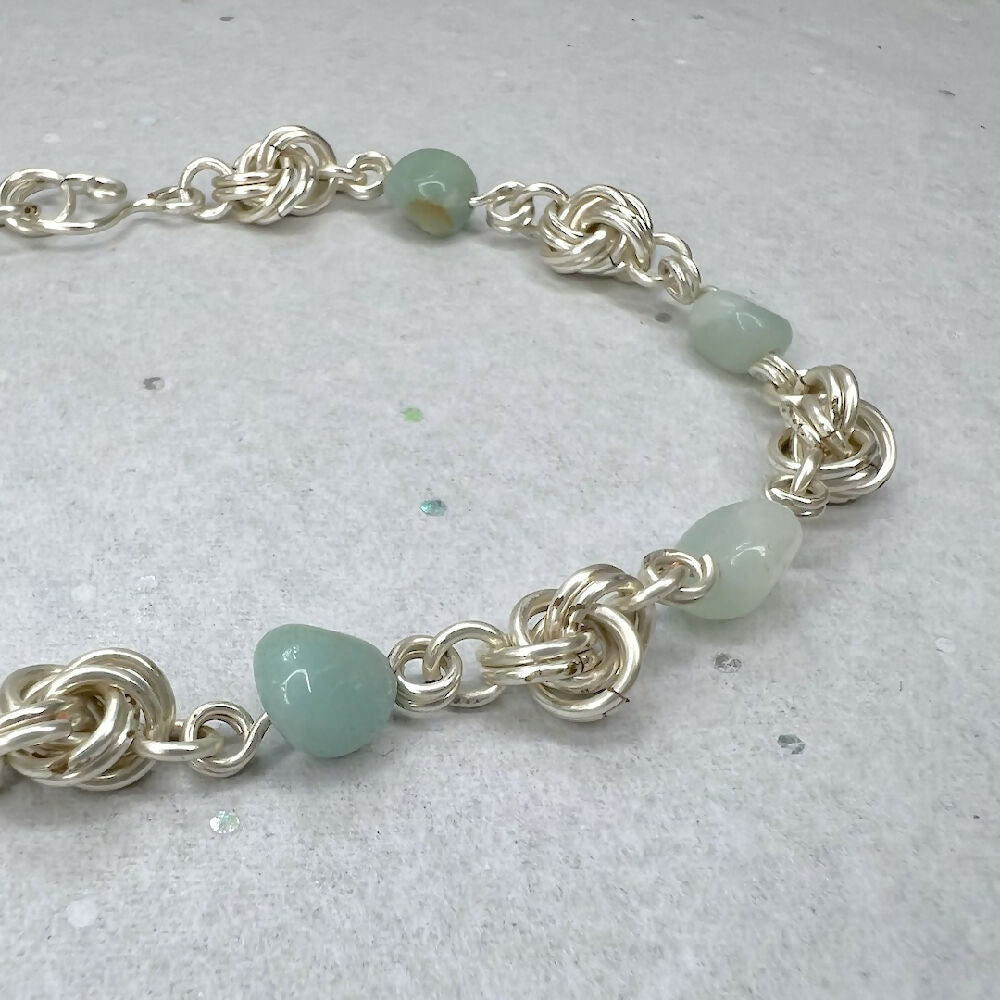 Silver-plated love knots amazonite bracelet detail