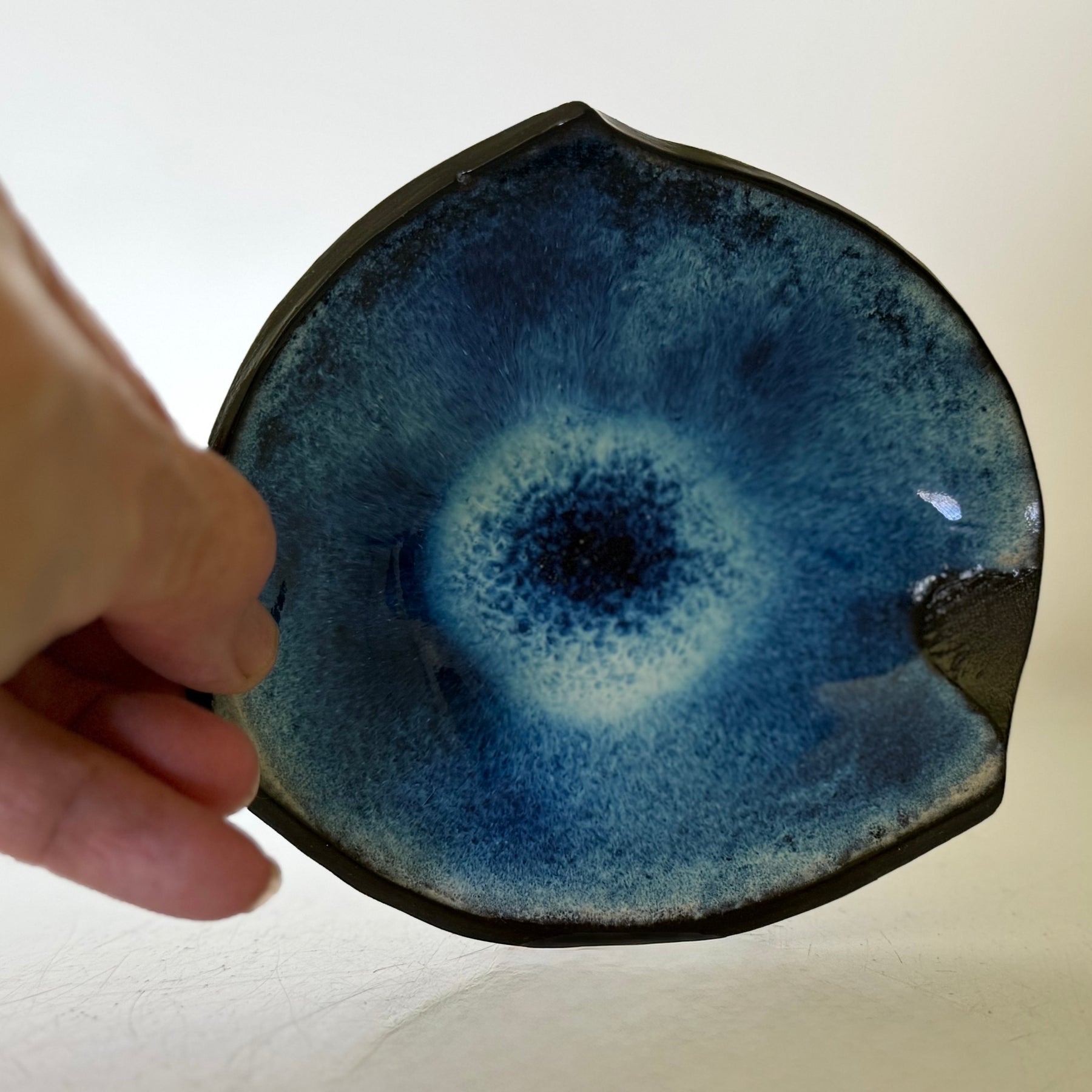 Small asymetrical blue dish