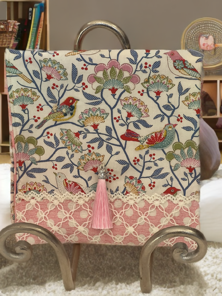 Padded pouch bag with lift up flap